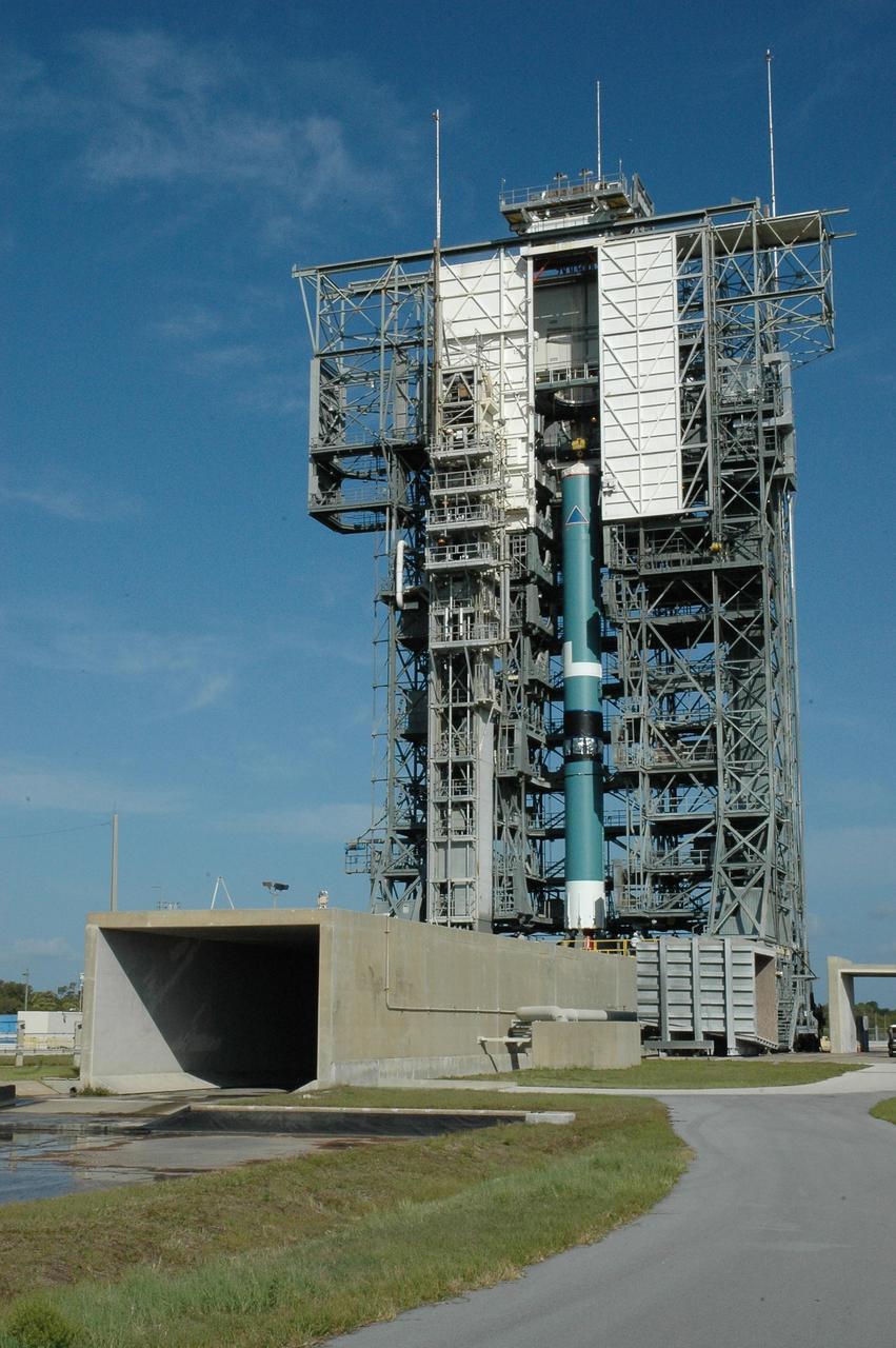 KENNEDY SPACE CENTER, FLA. --  In the mobile service tower on Launch Pad 17-B at Cape Canaveral Air Force Station, the Delta II first stage is ready to receive the upper stages and solid rocket boosters for launch.  The rocket is the launch vehicle for the Dawn spacecraft, targeted for liftoff on June 30. Dawn's mission is to explore two of the asteroid belt's most intriguing and dissimilar occupants: asteroid Vesta and the dwarf planet Ceres.   Photo credit: NASA/Amanda Diller