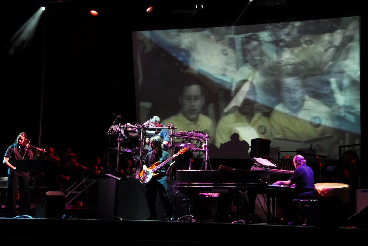 KENNEDY SPACE CENTER, FLA. -- Following the debut of its new attraction, Shuttle Launch Experience, on May 26, the Kennedy Space Center Visitor Complex treated guests to a concert by the instrumental group Mannheim Steamroller, seen here. Known for its digital-classic-rock style, Mannheim Steamroller recorded sound from the last space shuttle liftoff at Kennedy Space Center, and has incorporated it into its music.  Photo credit: NASA/George Shelton