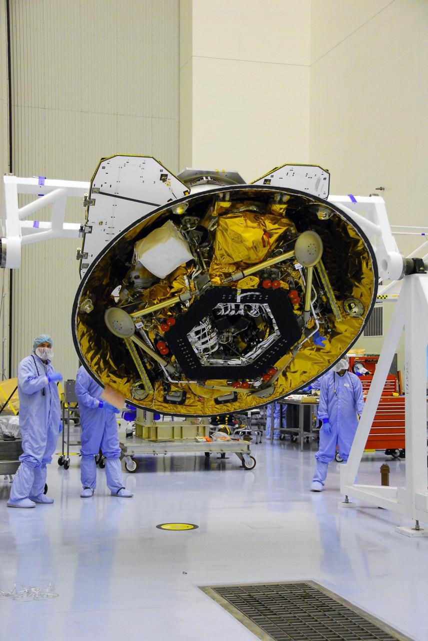 KENNEDY SPACE CENTER, FLA. --  In the Payload Handling Servicing Facility, the Phoenix spacecraft is being rotated for center of gravity determination. The Phoenix mission is the first project in NASA's first openly competed program of Mars Scout missions. Phoenix will land in icy soils near the north polar permanent ice cap of Mars and explore the history of the water in these soils and any associated rocks, while monitoring polar climate. Landing is planned in May 2008 on arctic ground where a mission currently in orbit, Mars Odyssey, has detected high concentrations of ice just beneath the top layer of soil. It will serve as NASA's first exploration of a potential modern habitat on Mars and open the door to a renewed search for carbon-bearing compounds, Photo credit: NASA/George Shelton