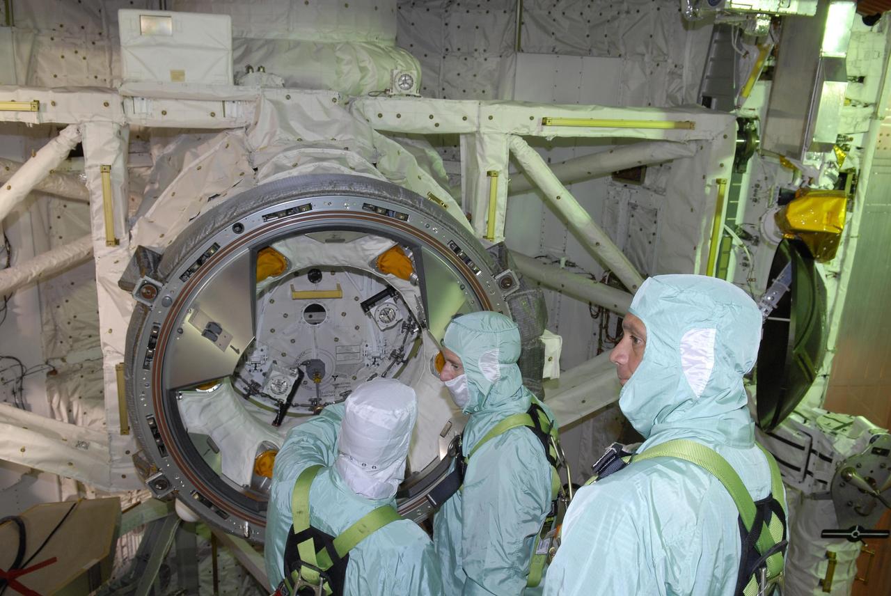 KENNEDY SPACE CENTER, FLA. --    After their arrival at KSC, STS-117 crew members take part in a payload bay walkdown on Launch Pad 39A to look at the cargo in Space Shuttle Atlantis. The payload includes the S3/S4 integrated truss structure for the International Space Station.  STS-117 is scheduled to launch at 7:38 p.m. June 8.  During the 11-day mission and three spacewalks, the crew will work with flight controllers at NASA's Johnson Space Center in Houston to install the 17-ton segment on the station's girder-like truss and deploy the set of solar arrays, S3/S4. The mission will increase the space station's power capability in preparation for the arrival of new science modules from the European and Japanese space agencies.    Photo credit: NASA/Kim Shiflett