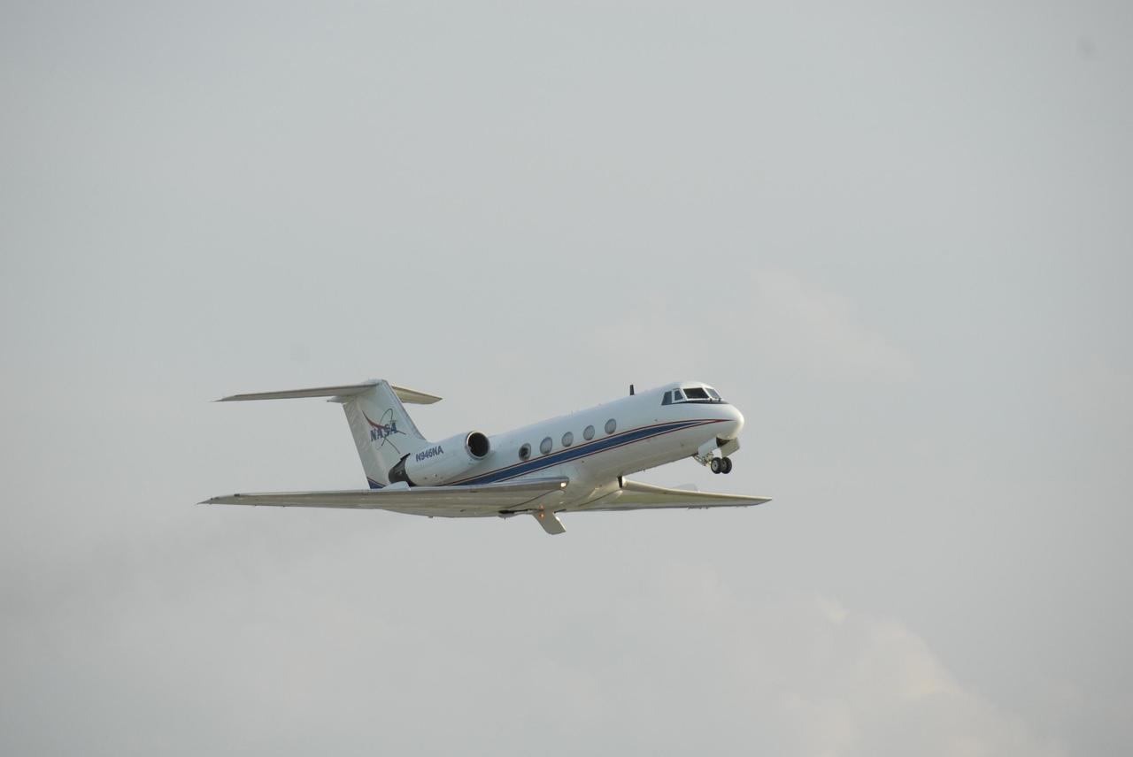 KENNEDY SPACE CENTER, FLA. --  It's wheels up for the shuttle training aircraft, or STA, after takeoff from KSC's Shuttle Landing Facility with STS-117 Commander Frederick Sturckow and Pilot Lee Archambault in the cockpit.  Sturckow and Archambault will be making practice landings in the STA, which is a Grumman American Aviation-built Gulf Stream II jet that was modified to simulate an orbiter's cockpit, motion and visual cues, and handling qualities.  In flight, the STA duplicates the orbiter's atmospheric descent trajectory from approximately 35,000 feet altitude to landing on a runway.  STS-117 is scheduled to launch at 7:38 p.m. June 8.  During the 11-day mission and three spacewalks, the crew will work with flight controllers at NASA's Johnson Space Center in Houston to install the 17-ton segment on the station's girder-like truss and deploy the set of solar arrays, S3/S4. The mission will increase the space station's power capability in preparation for the arrival of new science modules from the European and Japanese space agencies.  Photo credit: NASA/Kim Shiflett