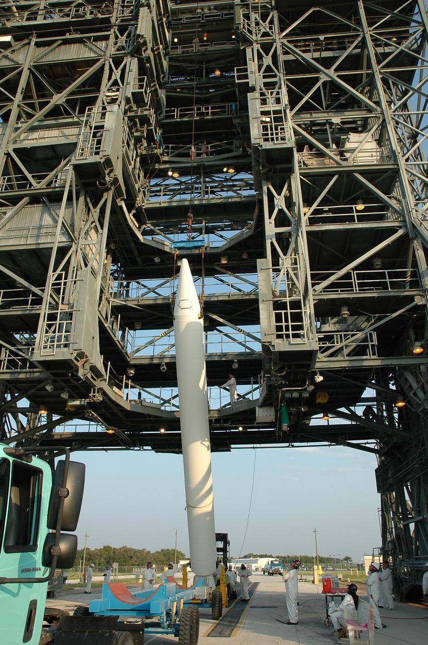 KENNEDY SPACE CENTER, FLA. -- A solid rocket booster is ready for lifting into the mobile service tower on Launch Pad 17-B at Cape Canaveral Air Force Station.  The booster will be mated to the Delta II first stage for launch of the Dawn spacecraft.  Dawn's goal is to characterize the conditions and processes of the solar system's earliest epoch 4.5 billion years ago by investigating in detail two of the largest asteroids, Ceres and Vesta. They reside between Mars and Jupiter in the asteroid belt.  Launch is targeted for July 7.  Photo credit: NASA/Jim Grossmann
