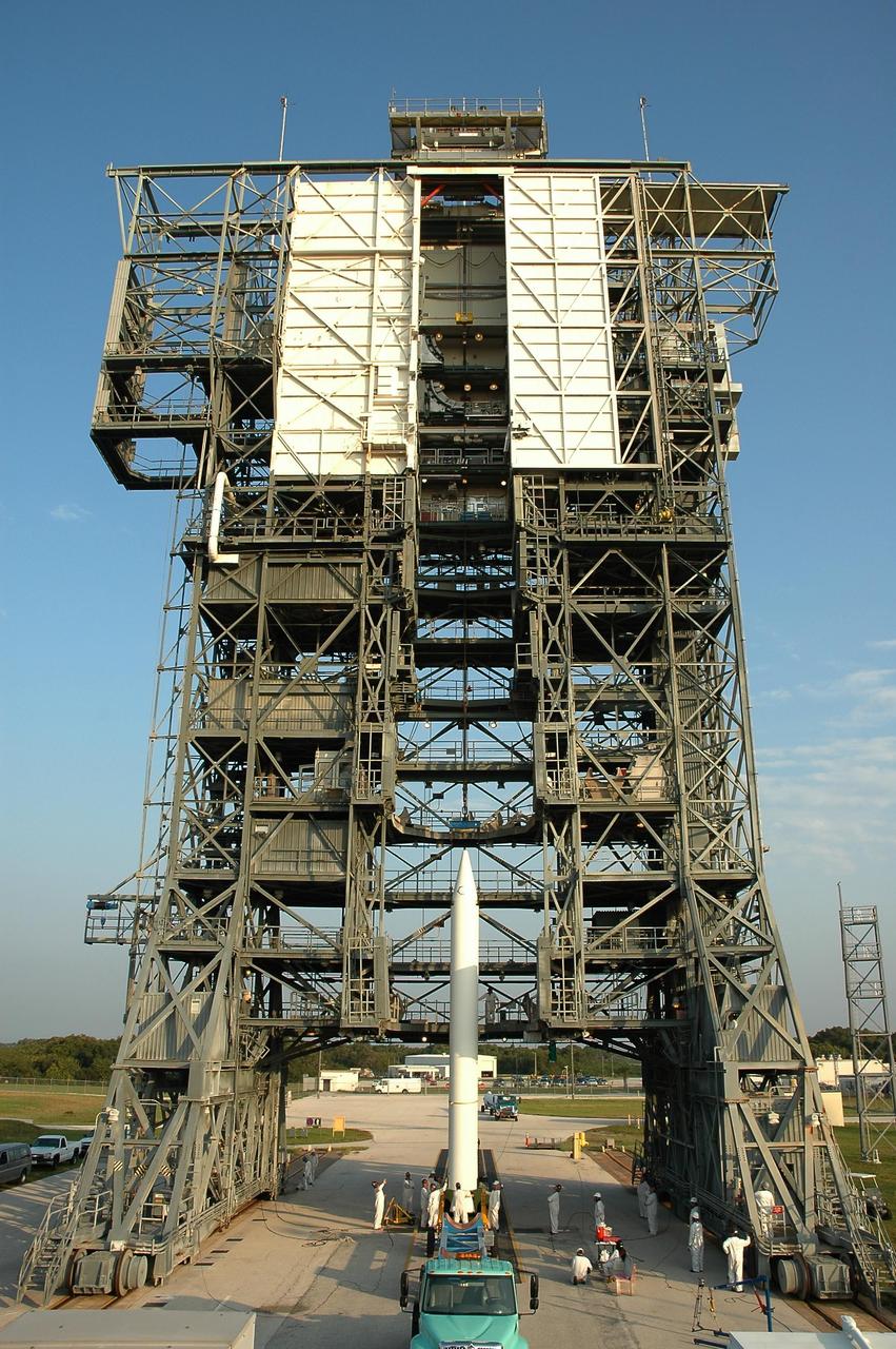 KENNEDY SPACE CENTER, FLA. -- A solid rocket booster is ready for lifting into the mobile service tower on Launch Pad 17-B at Cape Canaveral Air Force Station.  The booster will be mated to the Delta II first stage for launch of the Dawn spacecraft.  Dawn's goal is to characterize the conditions and processes of the solar system's earliest epoch 4.5 billion years ago by investigating in detail two of the largest asteroids, Ceres and Vesta. They reside between Mars and Jupiter in the asteroid belt.  Launch is targeted for July 7.  Photo credit: NASA/Jim Grossmann