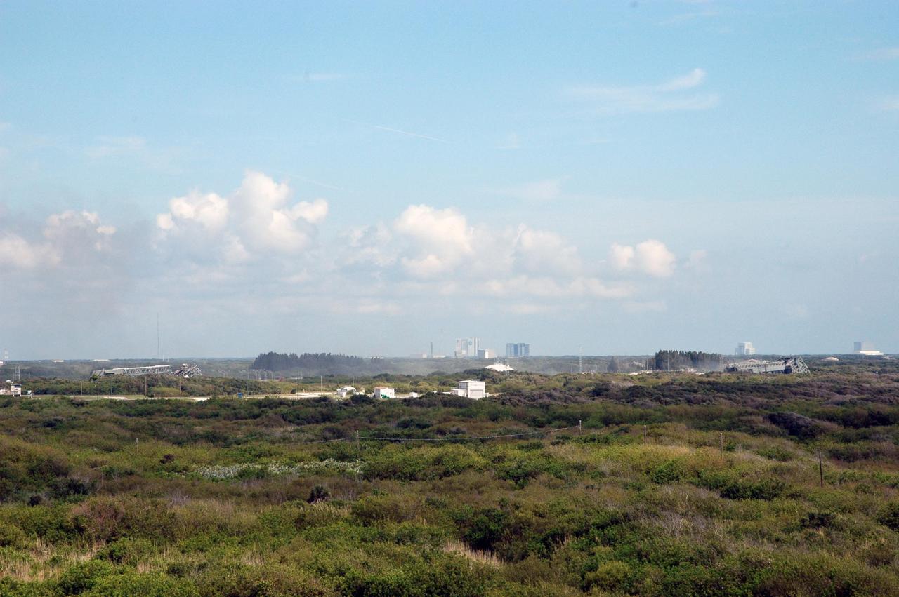 KENNEDY SPACE CENTER, FLA. --  This panoramic view of Space Launch Complex 36 on Cape Canaveral Air Force Station shows the two mobile service towers on the ground after their demolition. The old towers are being toppled as part of the ongoing project to demolish the historic site to prevent corrosion from becoming a safety concern.   A majority of the steel will be recycled and the rest will be taken to the landfill at CCAFS.  Complex 36 was the birthplace of NASA's planetary launch program.  It was built for the Atlas/Centaur development program and was operated under NASA's sponsorship until the late 1980s. Complex 36 hosted many historic missions over the years including Surveyor that landed on the moon and Mariner that orbited Mars and included one to Mercury.  Two of the most historic launches were the Pioneer 10 and 11 space probes that were launched to Jupiter and are now outside of the solar system in interstellar space.  Also, the historic Pioneer Venus spacecraft included an orbiter and a set of probes that were dispatched to the surface.  While Launch Complex 36 is gone, the Atlas/Centaur rocket continues to be launched as the Atlas V from Complex 41. Photo credit: NASA/Charisse Nahser