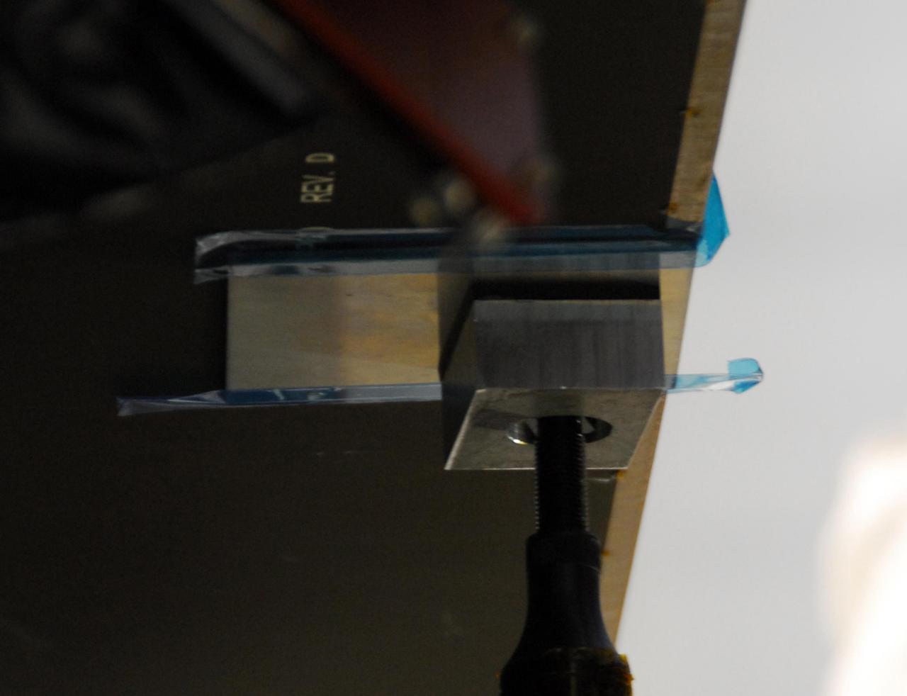 KENNEDY SPACE CENTER, FLA. -- The area of slight damage done by a technician's tool to the back of a solar array panel on the Dawn spacecraft is under repair. The damage occurred at Astrotech on June 11 during a procedure to prepare Dawn for spin-balance testing. The size of the affected area is about 2.5 inches by 2 inches. There is no impact to the launch date of July 7. Dawn's goal is to characterize the conditions and processes of the solar system's earliest epoch 4.5 billion years ago by investigating in detail two of the largest asteroids, Ceres and Vesta. They reside between Mars and Jupiter in the asteroid belt. Photo credit: NASA/George Shelton