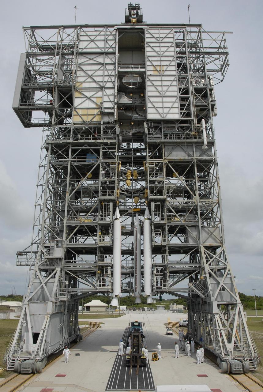 KENNEDY SPACE CENTER, FLA. -- On Pad 17-A at Cape Canaveral Air Force Station, three solid rocket boosters wait for the Delta II first stage to arrive at the mobile service tower. The SRBs will be mated with the Delta, which is the launch vehicle for the Phoenix Mars Lander spacecraft. Phoenix will land in icy soils near the north polar permanent ice cap of Mars and explore the history of the water in these soils and any associated rocks, while monitoring polar climate. Landing on Mars is planned in May 2008 on arctic ground where a mission currently in orbit, Mars Odyssey, has detected high concentrations of ice just beneath the top layer of soil. Phoenix is scheduled to launch Aug. 3. Photo credit: NASA/Kim Shiflett