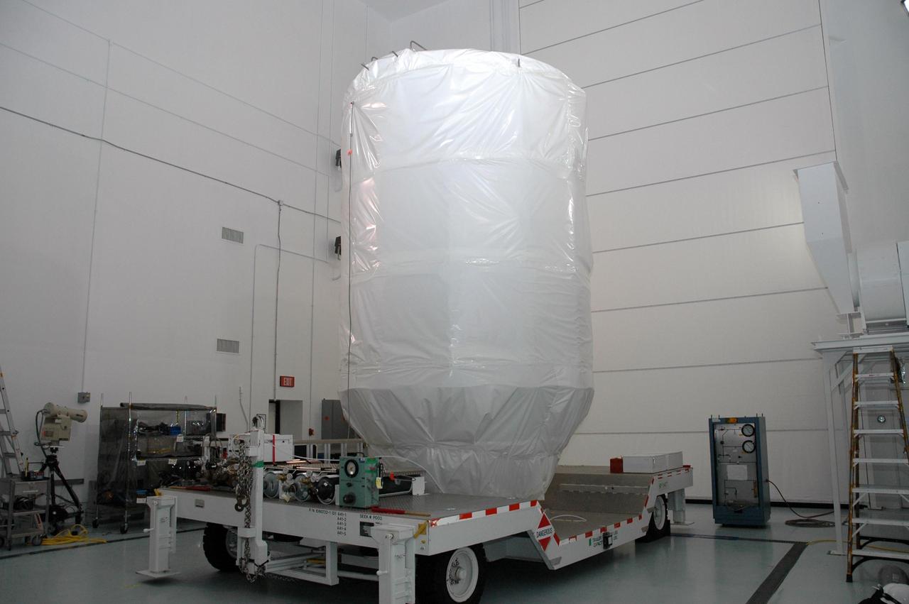 KENNEDY SPACE CENTER, FLA. -- Inside the Astrotech Facility in Titusville, Fla., NASA’s Dawn spacecraft is ready to be transported to Launch Pad 17-B at Cape Canaveral Air Force Station, for mate to the Delta II launch vehicle. Launch is scheduled for July 7. Dawn is the ninth mission in NASA's Discovery Program. The spacecraft will be the first to orbit two planetary bodies, asteroid Vesta and dwarf planet Ceres, during a single mission. Vesta and Ceres lie in the asteroid belt between Mars and Jupiter. It is also NASA's first purely scientific mission powered by three solar electric ion propulsion engines. Photo credit: NASA/Troy Cryder.