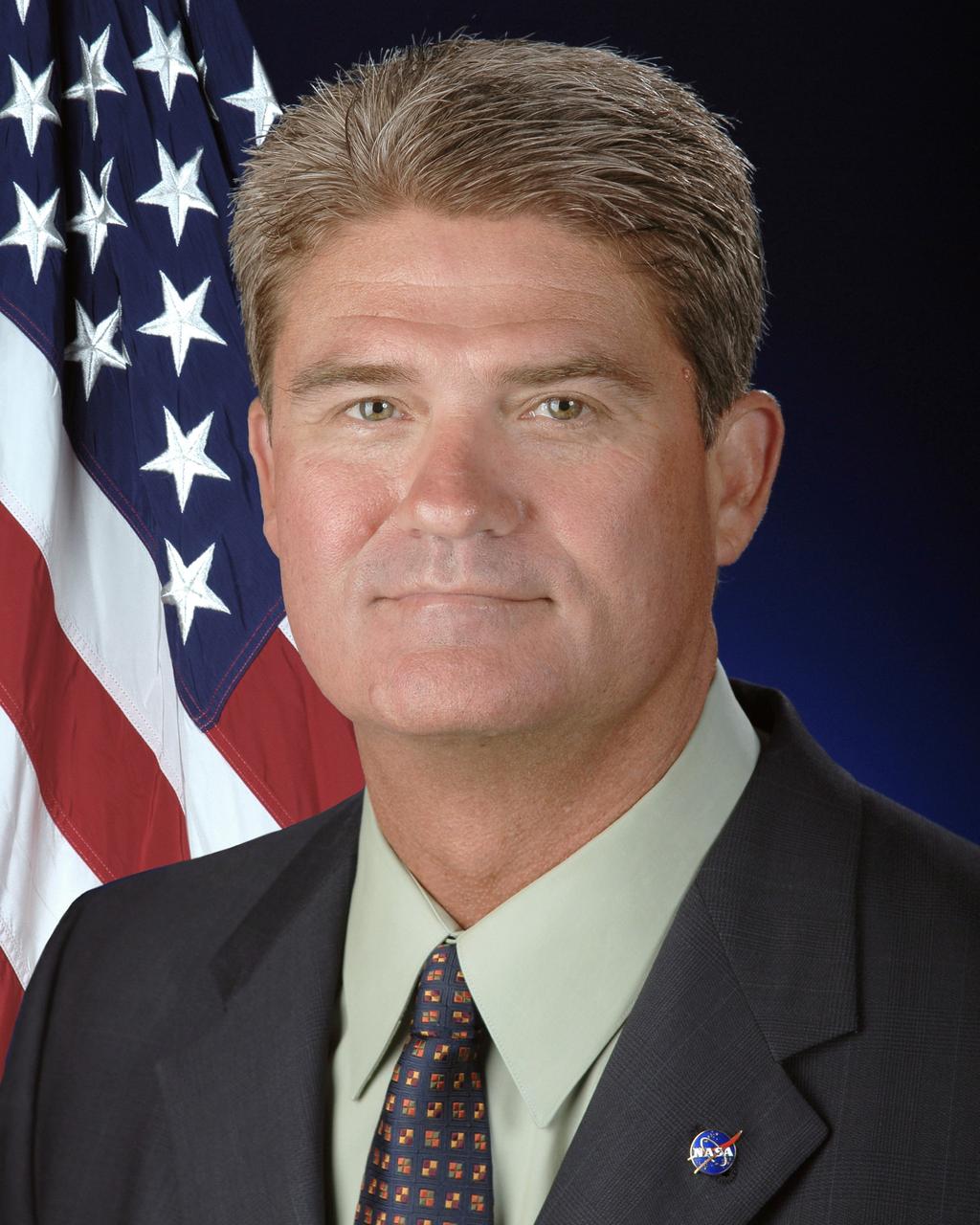 KENNEDY SPACE CENTER, FLA. - Official portrait of William W. "Bill" Parsons, director of the John F. Kennedy Space Center. Photo credit: NASA/Kim Shiflett