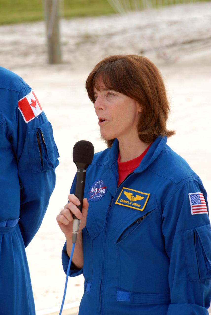 KENNEDY SPACE CENTER, Fla.  --  On the slidewire basket bunker area of Launch Pad 39A, STS-118 educator astronaut and Mission Specialist Barbara R. Morgan responds to a question from the media before the crew's morning training activities in the terminal countdown demonstration test, or TCDT.  Morgan joined NASA's Teacher in Space program in 1985 and was selected as an astronaut in 1998. TCDT activities include M-113 training, payload familiarization, the emergency egress training at the pad and a simulated launch countdown.  The mission is the 22nd flight to the International Space Station and Space Shuttle Endeavour will carry a payload including the S5 truss, a SPACEHAB module and external stowage platform 3. STS-118 is targeted for launch on Aug. 7.  NASA/George Shelton