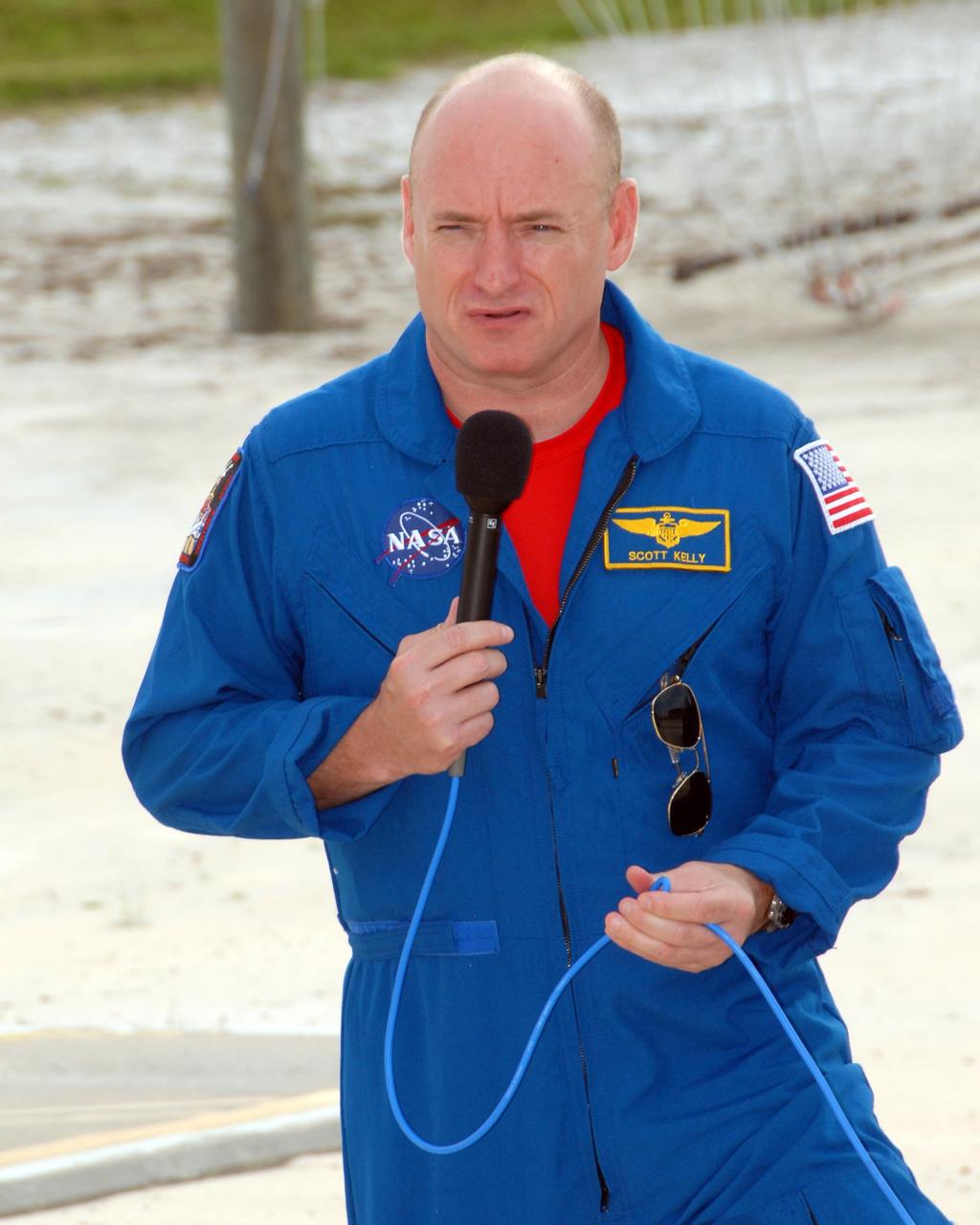 KENNEDY SPACE CENTER, Fla.  --   On the slidewire basket bunker area of Launch Pad 39A, STS-118 Commander Scott Kelly talks to the media before the crew's morning training activities in the terminal countdown demonstration test, or TCDT.  TCDT activities include M-113 training, payload familiarization, the emergency egress training at the pad and a simulated launch countdown.  The mission is the 22nd flight to the International Space Station and Space Shuttle Endeavour will carry a payload including the S5 truss, a SPACEHAB module and external stowage platform 3. STS-118 is targeted for launch on Aug. 7.  NASA/George Shelton