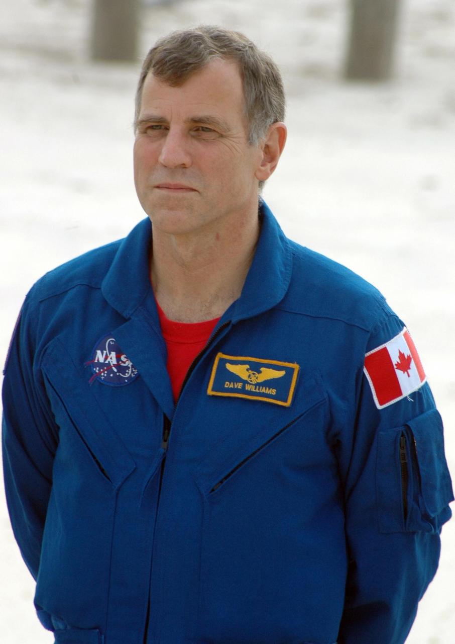 KENNEDY SPACE CENTER, Fla.  --  In the slidewire basket bunker area of Launch Pad 39A, STS-118 Mission Specialist Dave Williams is introduced to the press during a media interview before the crew's morning training activities in the terminal countdown demonstration test, or TCDT. Williams represents the Canadian Space Agency. TCDT activities include M-113 training, payload familiarization, the emergency egress training at the pad and a simulated launch countdown.  The mission is the 22nd flight to the International Space Station and Space Shuttle Endeavour will carry a payload including the S5 truss, a SPACEHAB module and external stowage platform 3. STS-118 is targeted for launch on Aug. 7.  Photo credit: NASA/Ken Thornsley