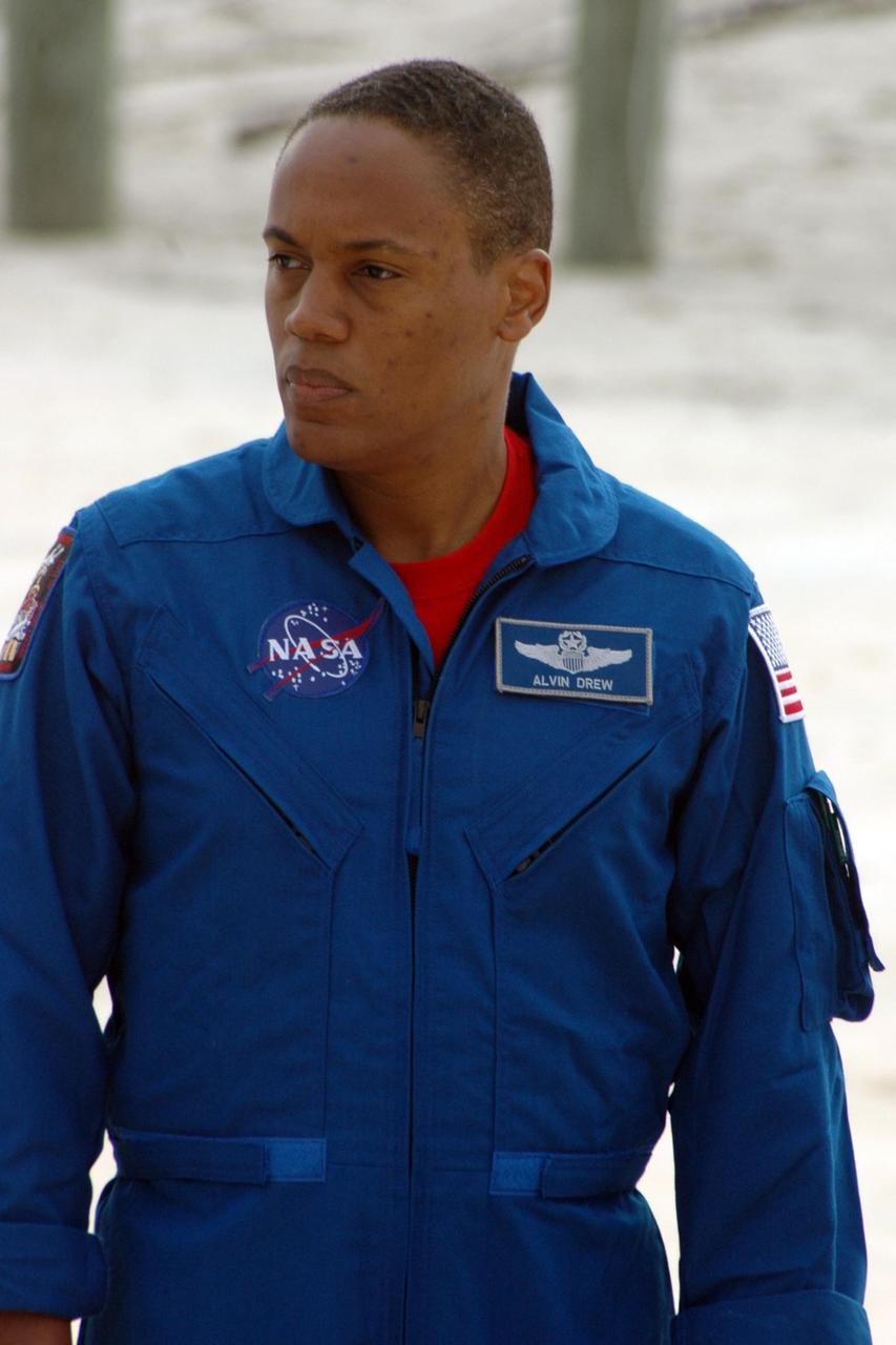 KENNEDY SPACE CENTER, Fla.  --  In the slidewire basket bunker area of Launch Pad 39A, STS-118 Mission Specialist Alvin Drew waits to begin a media interview before the crew's morning training activities in the terminal countdown demonstration test, or TCDT.  Those activities include M-113 training, payload familiarization, the emergency egress training at the pad and a simulated launch countdown.  The mission is the 22nd flight to the International Space Station and Space Shuttle Endeavour will carry a payload including the S5 truss, a SPACEHAB module and external stowage platform 3. STS-118 is targeted for launch on Aug. 7.  Photo credit: NASA/Ken Thornsley