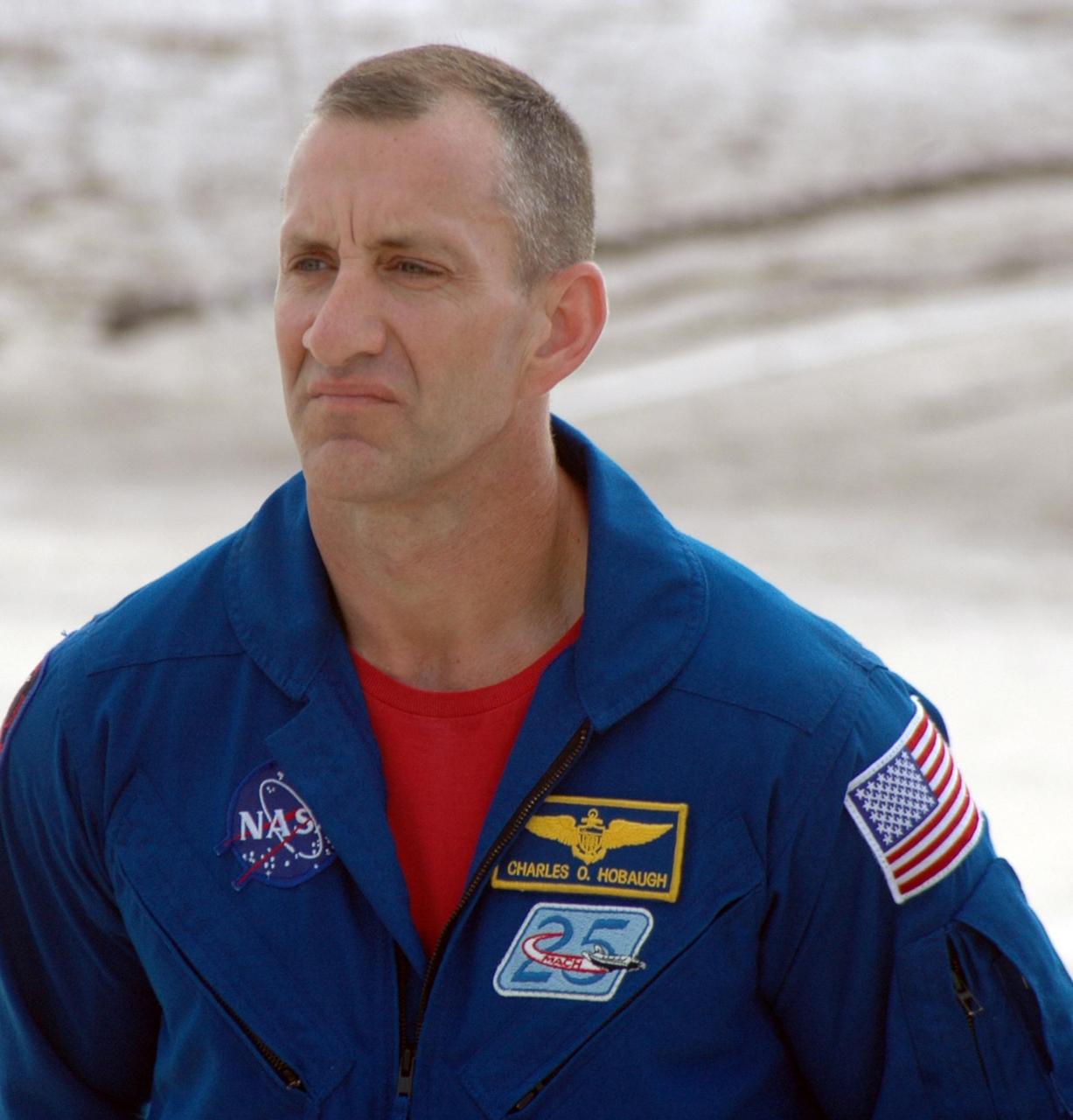 KENNEDY SPACE CENTER, Fla.  --  In the slidewire basket bunker area of Launch Pad 39A, STS-118 Pilot Charlie Hobaugh waits to begin a media interview before the crew's morning training activities in the terminal countdown demonstration test, or TCDT. Those activities include M-113 training, payload familiarization, the emergency egress training at the pad and a simulated launch countdown.  The mission is the 22nd flight to the International Space Station and Space Shuttle Endeavour will carry a payload including the S5 truss, a SPACEHAB module and external stowage platform 3. STS-118 is targeted for launch on Aug. 7.  Photo credit: NASA/Ken Thornsley