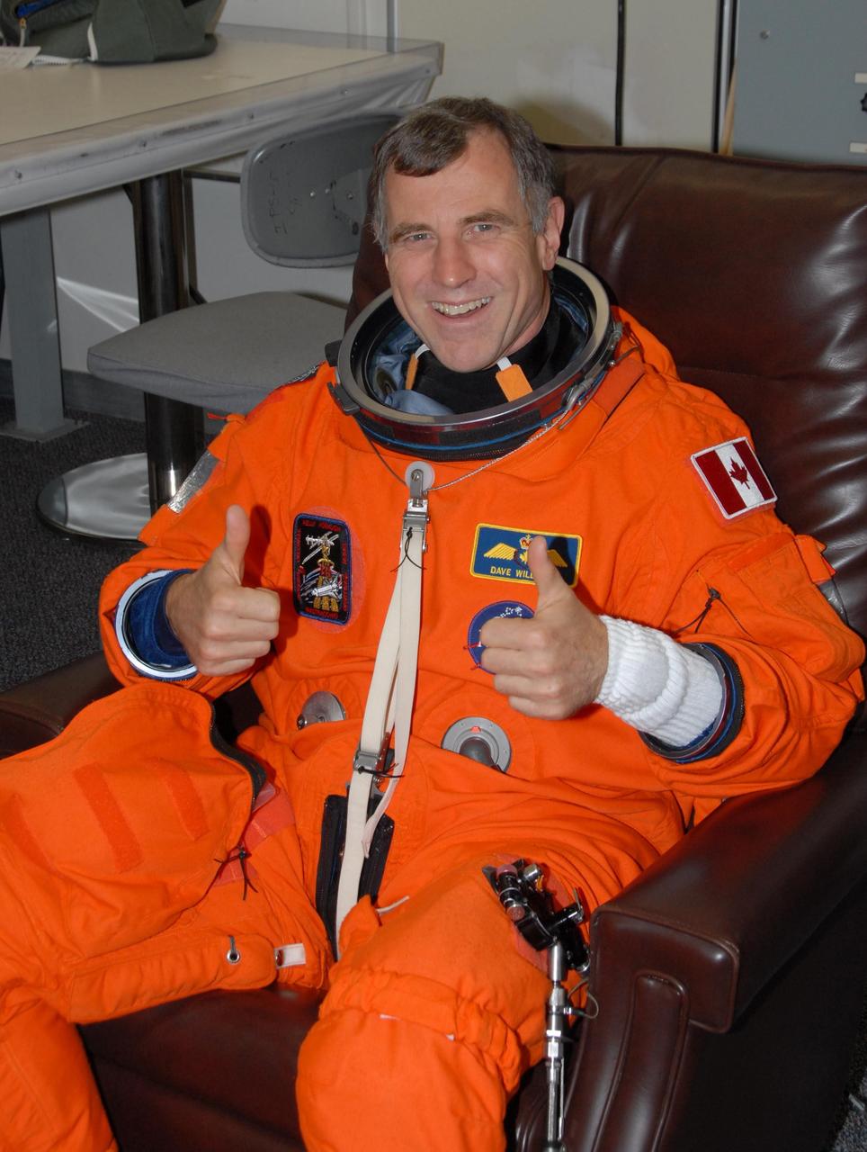KENNEDY SPACE CENTER, Fla. -- STS-118 Mission Specialist Dave Williams, who represents the Canadian Space Agency, is eager to start the simulated launch countdown that concludes the terminal countdown demonstration test, or TCDT. The STS-118 crew has been at Kennedy for the TCDT activities that also include M-113 training, payload familiarization and emergency egress training at the pad. The mission is the 22nd flight to the International Space Station and Space Shuttle Endeavour will carry a payload including the S5 truss, a SPACEHAB module and external stowage platform 3. STS-118 is targeted for launch on Aug. 7. Photo credit: NASA/George Shelton