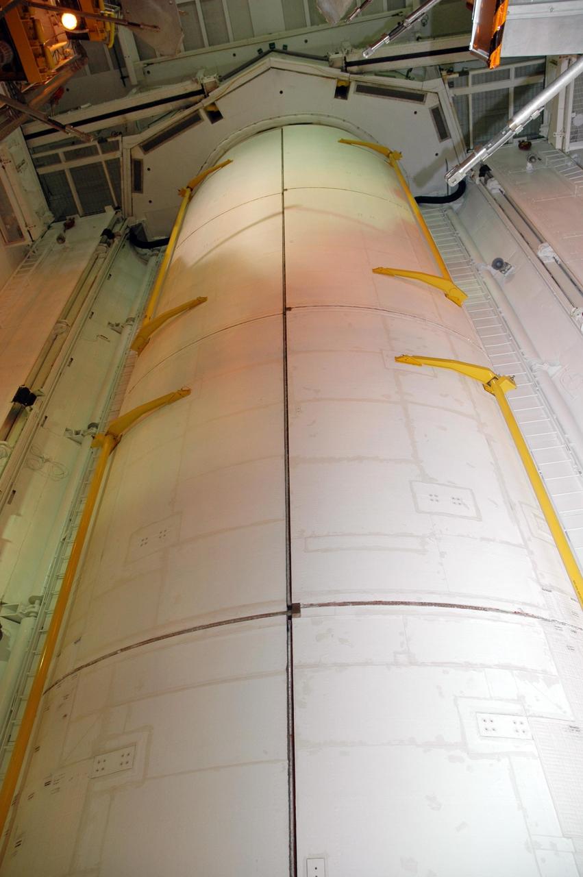KENNEDY SPACE CENTER, FLA. — From inside the payload changeout room at Launch Pad 39A, this view shows the payload bay doors on Endeavour fully closed. The payload includes the S5 truss, the SPACEHAB module and external stowage platform 3. The mission is the 22nd flight to the International Space Station and is targeted for launch on Aug. 7. NASA/Charisse Nahser
