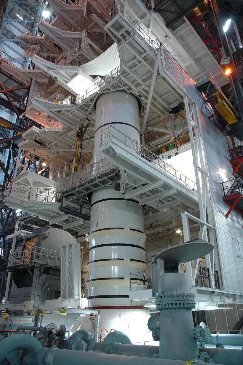 KENNEDY SPACE CENTER, FLA. -- In the Vehicle Assembly Building, the STS-120 solid rocket booster left aft booster and left aft center segments are being stacked on the mobile launcher platform. STS-120 will be the 23rd flight to the International Space Station. Space Shuttle Discovery will carry the U.S. Node 2. Launch is targeted for Oct. 20. NASA/Jim Grossmann