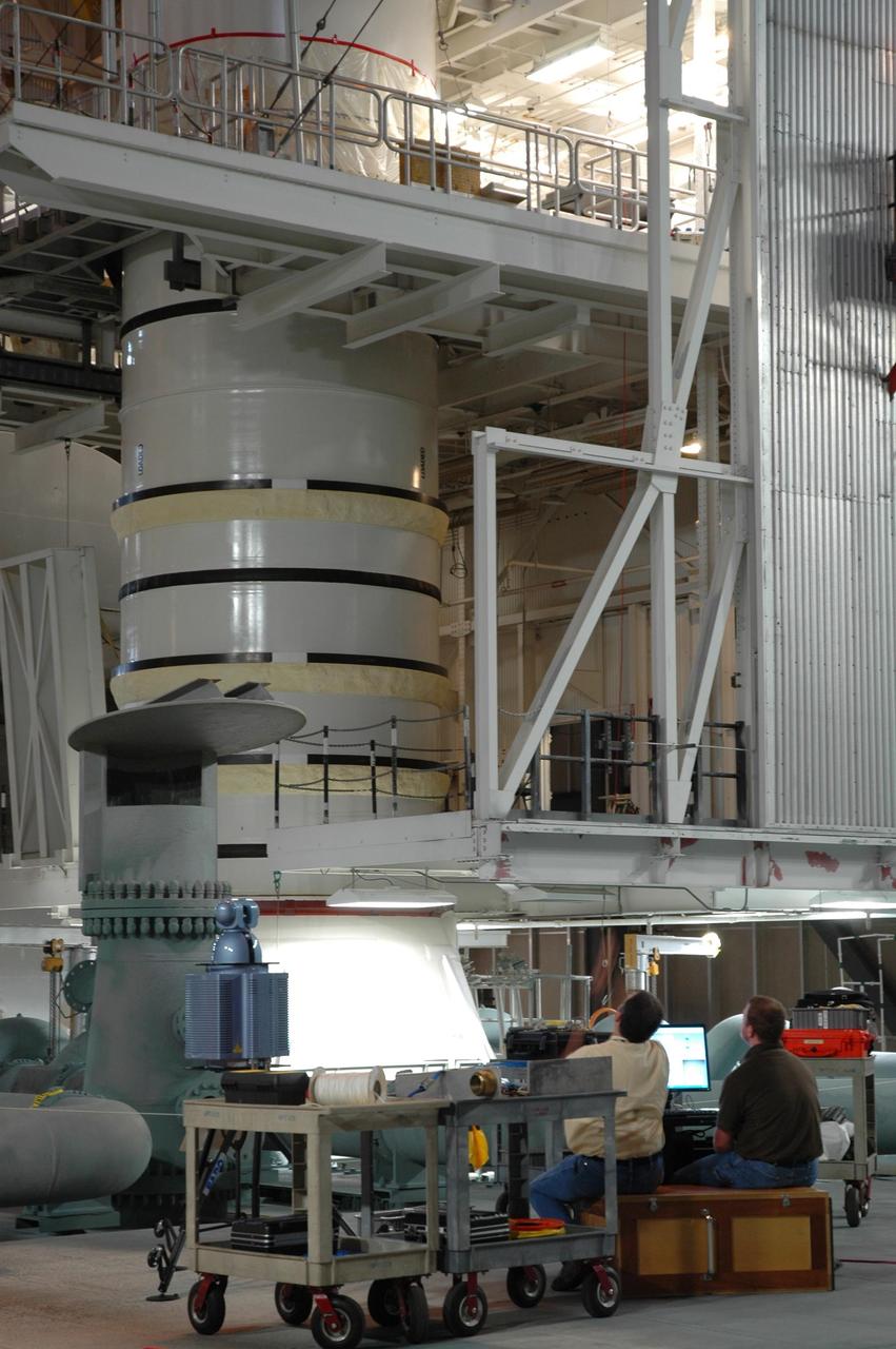 KENNEDY SPACE CENTER, FLA. -- In the Vehicle Assembly Building, the STS-120 solid rocket booster left aft booster and left aft center segments are being stacked on the mobile launcher platform. STS-120 will be the 23rd flight to the International Space Station. Space Shuttle Discovery will carry the U.S. Node 2. Launch is targeted for Oct. 20. NASA/Jim Grossmann