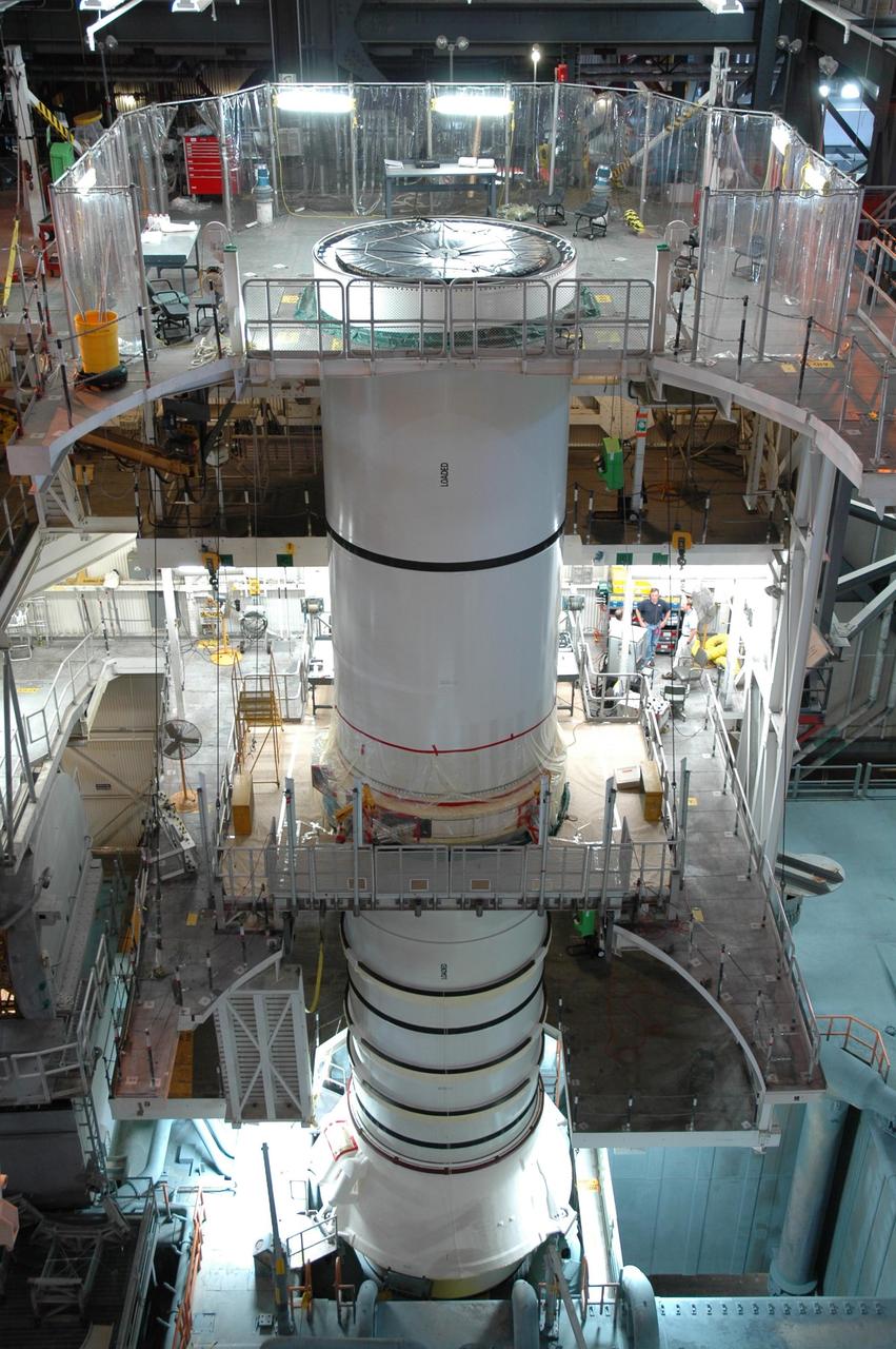 KENNEDY SPACE CENTER, FLA. -- In the Vehicle Assembly Building, the STS-120 solid rocket booster left aft booster and left aft center segments are being stacked on the mobile launcher platform. STS-120 will be the 23rd flight to the International Space Station. Space Shuttle Discovery will carry the U.S. Node 2. Launch is targeted for Oct. 20. NASA/Jim Grossmann