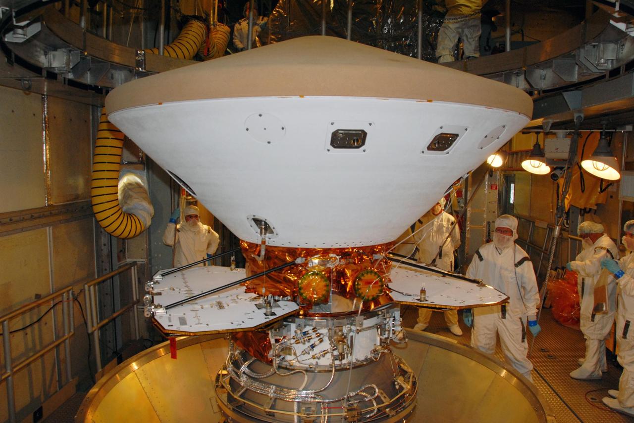 KENNEDY SPACE CENTER, FLA. -- NASA's Phoenix Mars Lander is revealed inside the mobile service tower of Launch Pad 17-A at Cape Canaveral Air Force Station in Florida, after workers removed the coverings protecting the spacecraft. Launch of Phoenix on a Delta II launch vehicle is scheduled for no earlier than Aug. 3. Phoenix will land in icy soils near the north polar permanent ice cap of Mars and explore the history of the water in these soils and any associated rocks, while monitoring polar climate. Landing on Mars is planned in May 2008 on arctic ground where a mission currently in orbit, Mars Odyssey, detected high concentrations of ice just beneath the top layer of soil. NASA/George Shelton