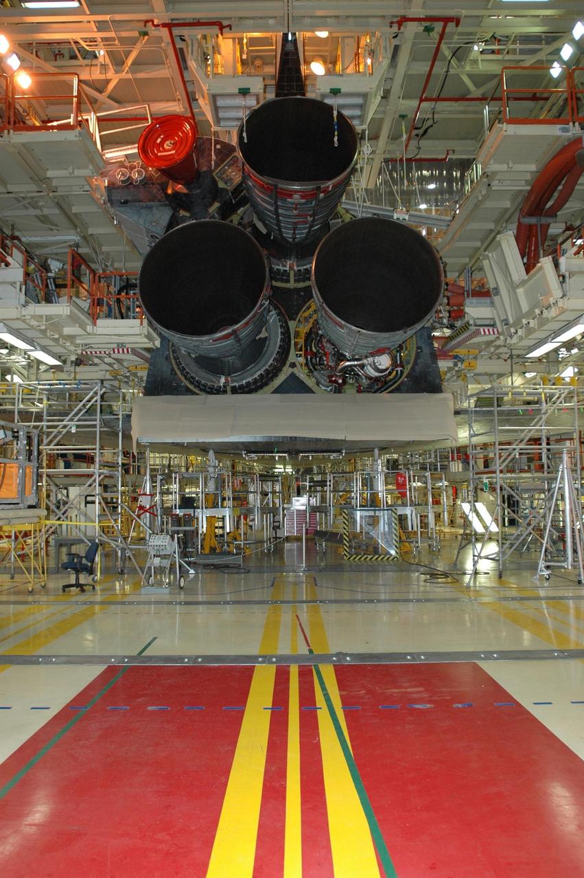 KENNEDY SPACE CENTER, FLA.  --   Inside Orbiter Processing Facility 3 at Kennedy Space Center, the massive space shuttle main engines can be seen installed on orbiter Discovery during processing for mission STS-120. Mission STS-120 will be the 23rd flight to the International Space Station. Space Shuttle Discovery will carry the U.S. Node 2. Launch is targeted for Oct. 20. NASA/Dimitri Gerondidakis