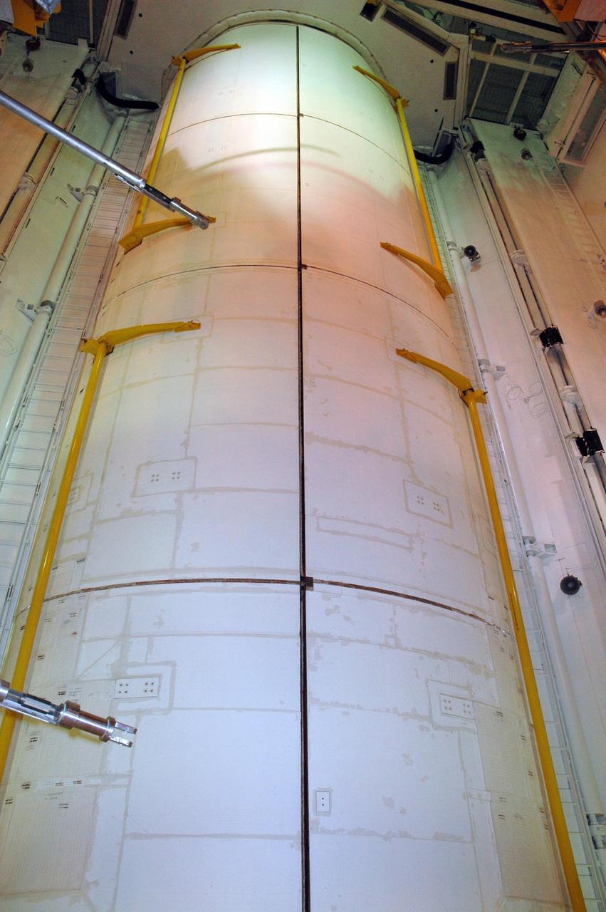 KENNEDY SPACE CENTER, FLA. -- On Launch Pad 39A, Endeavour's payload bay doors are again closed and secure for launch. The payload bay doors were opened to allow for payload closeouts, including camera tests on the shuttle robotic arm and the extension, known as the orbiter boom sensor system. Endeavour is scheduled to launch Aug. 7 on mission STS-118, the 22nd flight to the International Space Station. NASA/Charisse Nahser