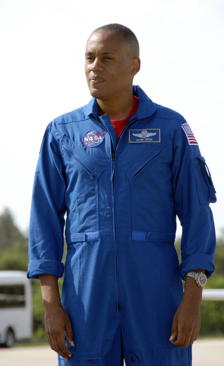KENNEDY SPACE CENTER, FLA. --   The STS-118 crew arrives at Kennedy Space Center's Shuttle Landing Facility to prepare for launch on Aug. 8 aboard Space Shuttle Endeavour. Seen here is Mission Specialist Alvin Drew as he talks to the media. Endeavour's STS-118 mission is the 22nd shuttle flight to the International Space Station. It will continue space station construction by delivering a third starboard truss segment, S5.  Other payloads include the SPACEHAB module, making its last voyage, and the external stowage platform 3 with a control moment gyroscope on it. The flight will include at least three spacewalks. The crew will also debut a new system that enables docked shuttles to draw electrical power from the station to extend visits to the outpost.  NASA/Kim Shiflett