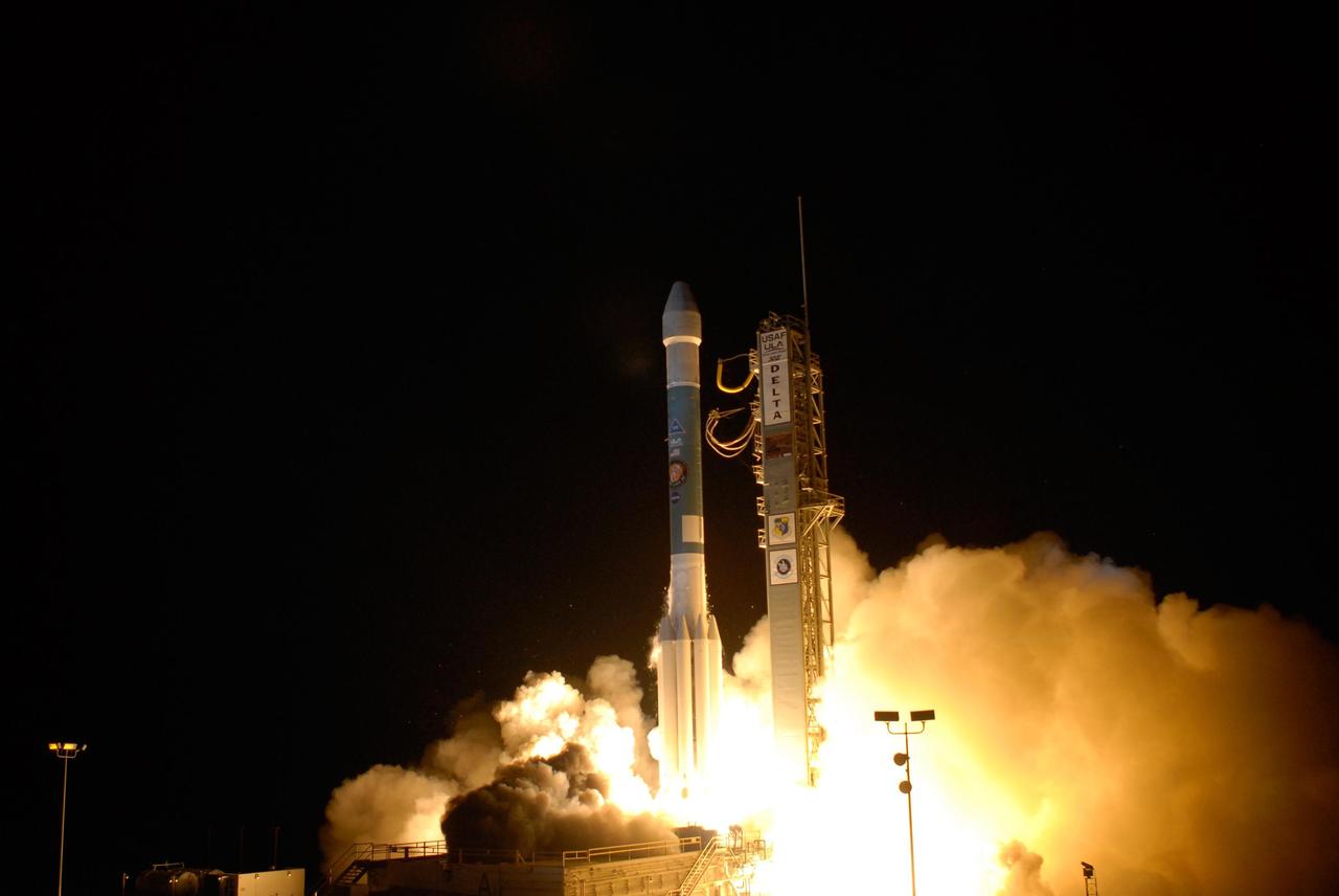 KENNEDY SPACE CENTER, FLA. - NASA's Phoenix Mars lander lifts off from Pad 17A aboard a Delta II 7925 rocket amid billows of smoke at Cape Canaveral Air Force Station at 5:26 a.m. EDT. Phoenix will land in icy soils near the north polar, permanent ice cap of Mars and explore the history of the water in these soils and any associated rocks, while monitoring polar climate. Landing on Mars is planned in May 2008 on arctic ground where a mission currently in orbit, Mars Odyssey, has detected high concentrations of ice just beneath the top layer of soil. Photo credit: NASA/Regina Mitchell-Ryall and Jerry Cannon