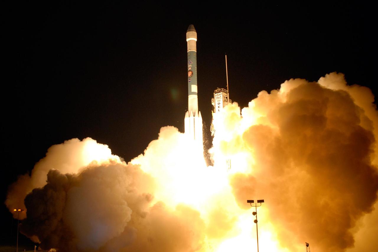 KENNEDY SPACE CENTER, FLA. - NASA's Phoenix Mars lander lifts off from Pad 17A aboard a Delta II 7925 rocket at 5:26 a.m. EDT, illuminating the night sky over Cape Canaveral Air Force Station. Phoenix will land in icy soils near the north polar, permanent ice cap of Mars and explore the history of the water in these soils and any associated rocks, while monitoring polar climate. Landing on Mars is planned in May 2008 on arctic ground where a mission currently in orbit, Mars Odyssey, has detected high concentrations of ice just beneath the top layer of soil.   Photo credit: NASA/Regina Mitchell-Ryall and Jerry Cannon