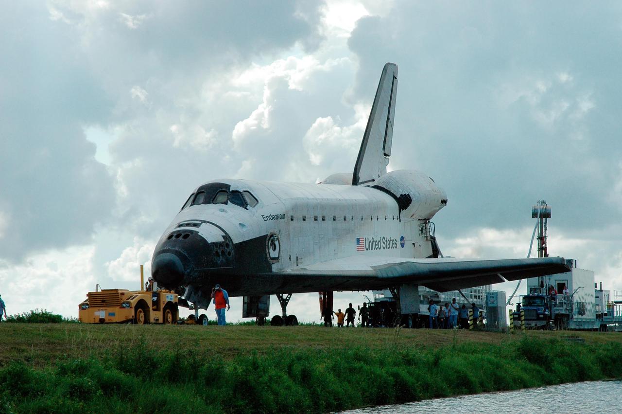 KENNEDY SPACE CENTER, FLA. --   On the Shuttle Landing Facility at NASA's Kennedy Space Center, the orbiter Endeavour is ready to be towed to the Orbiter Processing Facility, known as the OPF. Endeavour returned to Earth Aug. 21 from mission STS-118, landing at Kennedy at 12:32 p.m. EDT. In the OPF bay 2, Endeavour will incur thermal protection system inspections and numerous other post-flight inspections before processing starts for its next voyage into space.  Endeavour will next fly on mission STS-123 targeted for Feb. 14, 2008.  Photo credit: NASA/Jack Pfaller