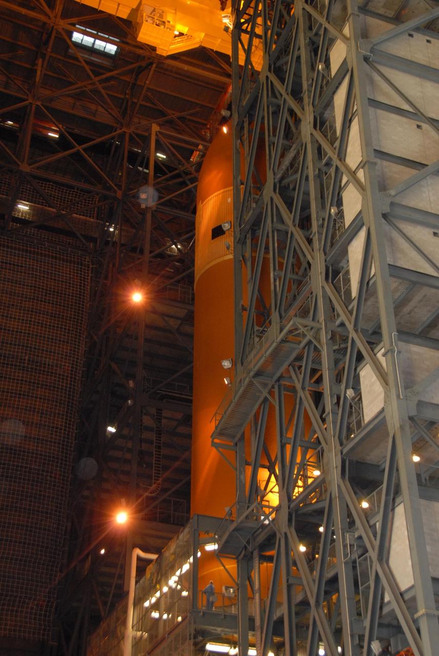 KENNEDY SPACE CENTER, FLA. --   In the Vehicle Assembly Building at NASA's Kennedy Space Center, external tank No. 120 is being lifted out of the checkout cell to high bay 1 where it will be mated with the solid rocket boosters. The external tank-SRB stack is being prepared for the orbiter Discovery, which will be mated to the stack in the VAB in two weeks.  Space Shuttle Discovery is targeted to launch Oct. 23 on mission STS-120 to the International Space Station.  Photo credit: NASA/George Shelton