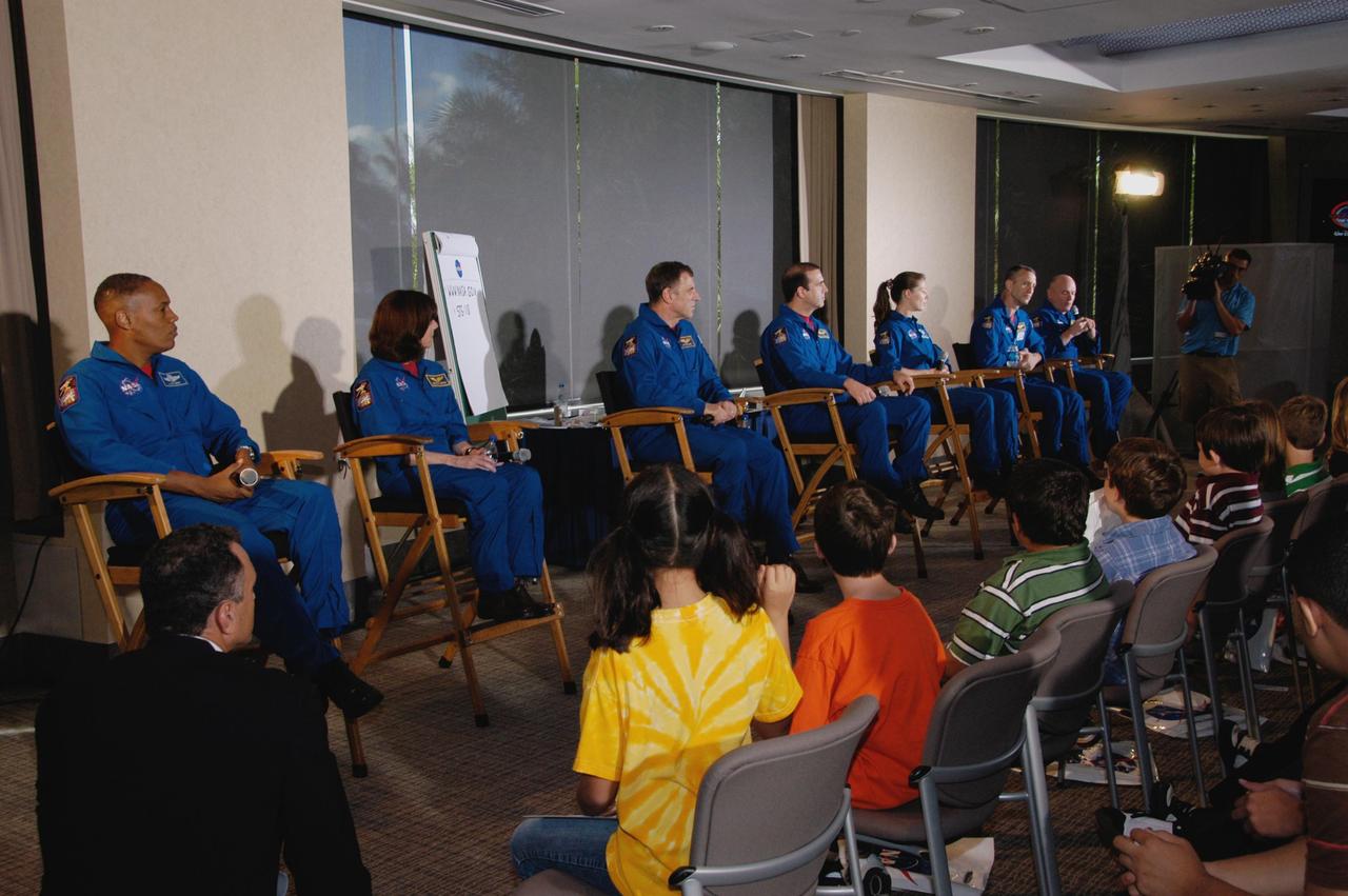 KENNEDY SPACE CENTER, FLA. -- At Walt Disney World in Orlando, the crew members of space shuttle mission STS-118 answer questions from the student audience during a special event to honor the Endeavour crew.  Seated from left are Mission Specialists Alvin Drew, Barbara R. Morgan, Dave Williams, Rick Mastracchio and Tracy Caldwell; Pilot Charlie Hobaugh; and Commander Scott Kelly.  The event also honored teacher-turned-astronaut Morgan, who dedicated a plaque outside the Mission: Space attraction.   Other activities included meeting with the media and a parade down Main Street.  Mission STS-118 was the 119th shuttle program flight and the 22nd flight to the International Space Station.  Space shuttle Endeavour launched from NASA's Kennedy Space Center on Aug. 8 and landed Aug. 21.  The mission delivered the S5 truss, continuing the assembly of the space station.  Photo credit: NASA/George Shelton