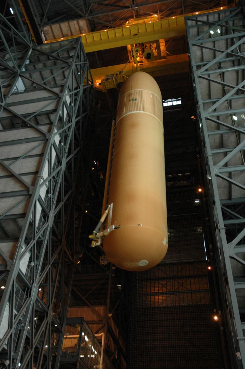 KENNEDY SPACE CENTER, FLA. --  Seen from below, external tank No. 125 is moved toward a checkout cell in high bay 4 in the Vehicle Assembly Building for processing.  The tank will be part of the space shuttle stack for mission STS-122 targeted to launch Dec. 6.  Photo credit: NASA/Troy Cryder