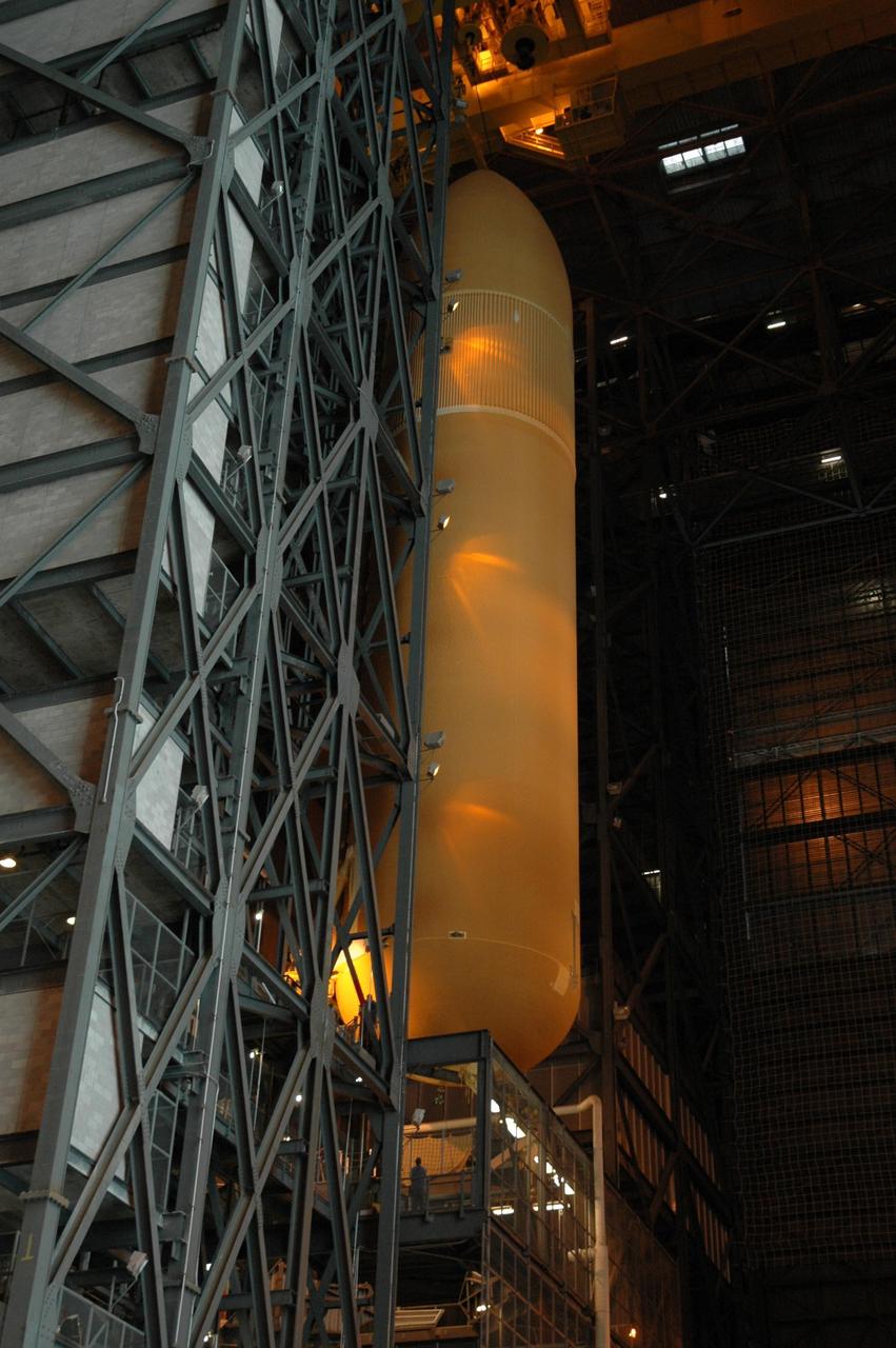 KENNEDY SPACE CENTER, FLA. --  External tank No. 125 is moved toward a checkout cell in high bay 4 in the Vehicle Assembly Building for processing. The tank will be part of the space shuttle stack for mission STS-122 targeted to launch Dec. 6.  Photo credit: NASA/Troy Cryder