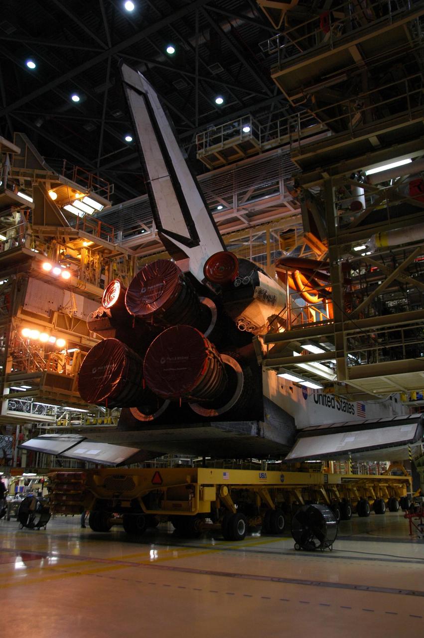 KENNEDY SPACE CENTER, FLA. -- Space shuttle Discovery is ready to roll out of the Orbiter Processing Facility bay 3 on its transporter for the short trip to the Vehicle Assembly Building. In the VAB, the shuttle will be lifted and mated with the external tank and solid rocket boosters on the mobile launcher platform. Discovery is targeted for launch to the International Space Station for mission STS-120 on Oct. 23. The crew will be delivering and installing the Italian-built U.S. Node 2, named Harmony. The pressurized module will act as an internal connecting port and passageway to additional international science labs and cargo spacecraft. In addition to increasing the living and working space inside the station, it also will serve as a work platform outside for the station's robotic arm. Photo credit: NASA/Amanda Diller
