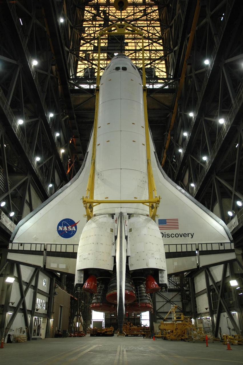 KENNEDY SPACE CENTER, FLA. -- Inside the Vehicle Assembly Building, space shuttle Discovery is ready to be lifted into high bay 1. In the bay, Discovery will be mated with the external tank and solid rocket boosters waiting on the mobile launcher platform. Discovery is targeted for launch to the International Space Station for mission STS-120 on Oct. 23. The crew will be delivering and installing the Italian-built U.S. Node 2, named Harmony. The pressurized module will act as an internal connecting port and passageway to additional international science labs and cargo spacecraft. In addition to increasing the living and working space inside the station, it also will serve as a work platform outside for the station's robotic arm. Photo credit: NASA/Troy Cryder