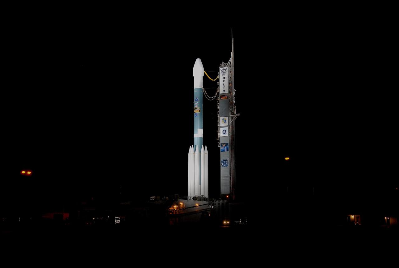 KENNEDY SPACE CENTER, FLA. -- Rollback of the mobile service tower, or gantry, from the Delta II rocket is complete on Launch Pad 17B at Cape Canaveral Air Force Station. Starting with a boost from this higher thrust version of the Delta II rocket, the Dawn spacecraft will study the asteroid Vesta and dwarf planet Ceres, celestial bodies believed to have accreted early in the history of the solar system. To carry out its scientific mission during its nearly decade-long mission, Dawn will carry a visible camera, a visible and infrared mapping spectrometer, and a gamma ray and neutron spectrometer, whose data will be used in combination to characterize these bodies. In addition to the three instruments, radiometric and optical navigation data will provide data relating to the gravity field, and thus, bulk properties and internal structure of the two bodies. Data returned from the Dawn spacecraft could provide opportunities for significant breakthroughs in our knowledge of how the solar system formed. Launch is targeted for Sept. 27 during a window that extends from 7:20 to 7:49 a.m. EDT. Photo credit: NASA/Kim Shiflett