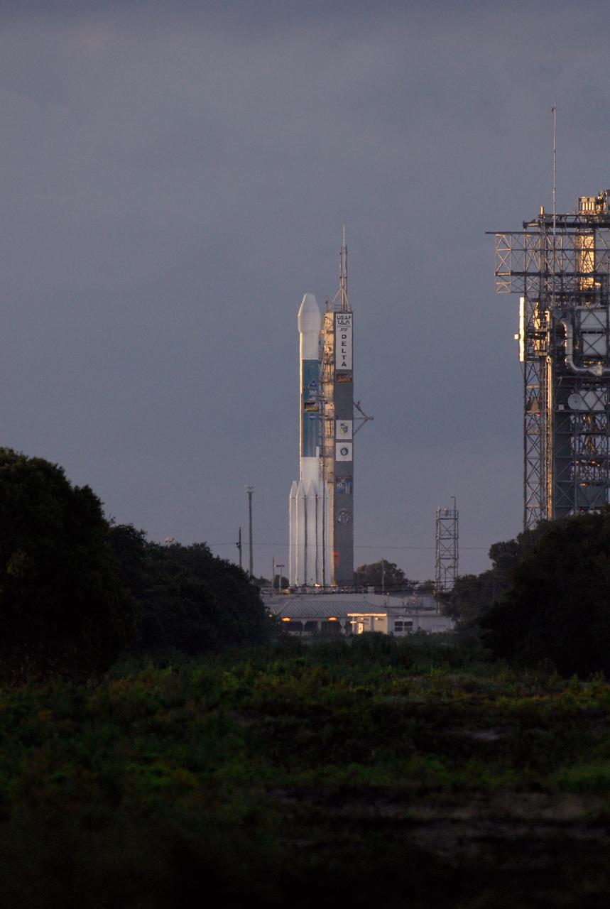 KENNEDY SPACE CENTER, FLA. -- The Delta II rocket with the Dawn spacecraft on top waits in the early morning light for launch. Liftoff was at 7:34 a.m. EDT from Pad 17-B at Cape Canaveral Air Force Station. Dawn is the ninth mission in NASA's Discovery Program. The spacecraft will be the first to orbit two planetary bodies, asteroid Vesta and dwarf planet Ceres, during a single mission. Vesta and Ceres lie in the asteroid belt between Mars and Jupiter. It is also NASA's first purely scientific mission powered by three solar electric ion propulsion engines. Photo credit: NASA/Kim Shiflett