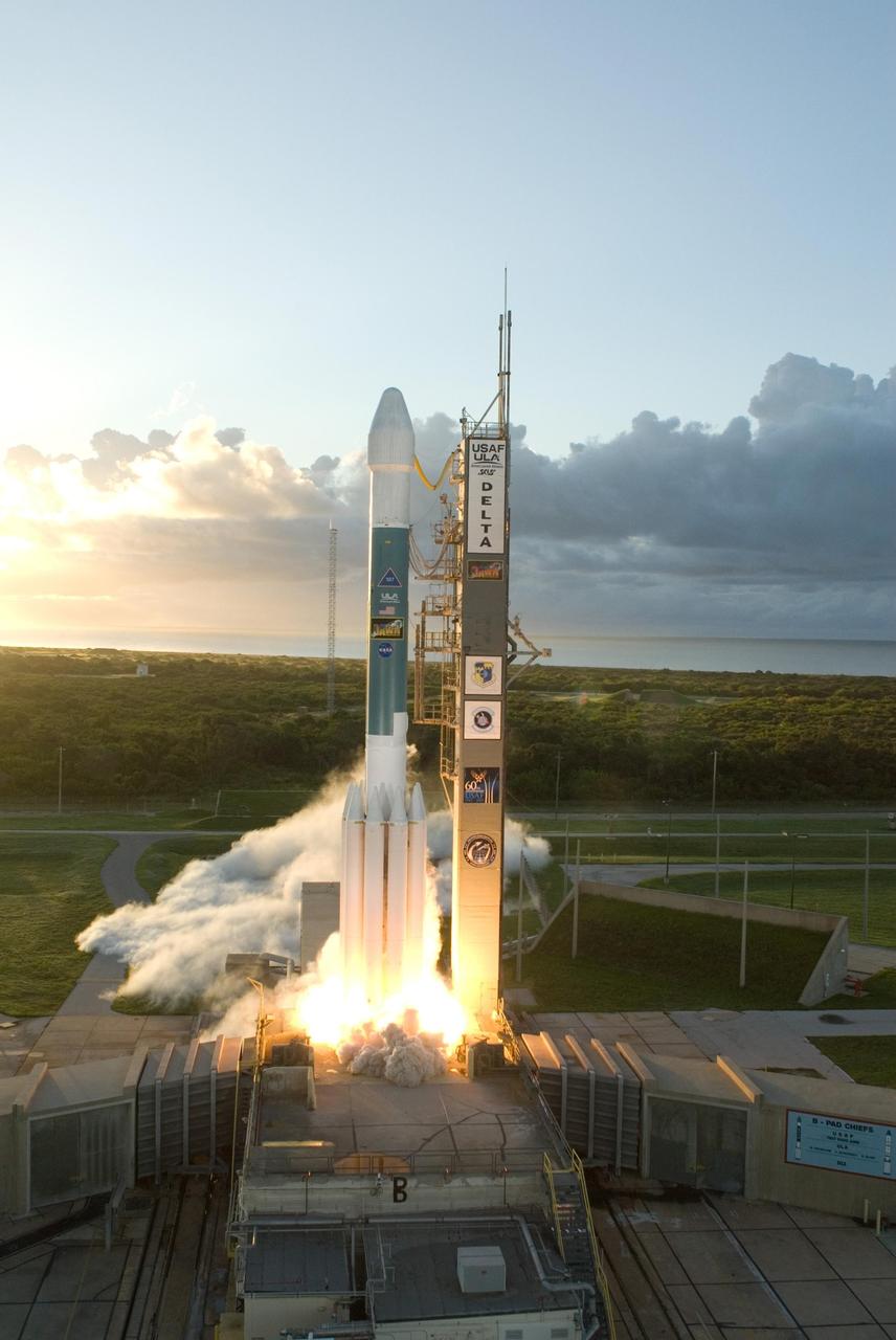 KENNEDY SPACE CENTER, FLA. -- Just after sunrise, the Delta II rocket carrying NASA's Dawn spacecraft rose from its launch pad to begin its 1.7-billion-mile journey through the inner solar system to study a pair of asteroids.  Liftoff was at 7:34 a.m. EDT from Pad 17-B at Cape Canaveral Air Force Station.  Dawn is the ninth mission in NASA's Discovery Program. The spacecraft will be the first to orbit two planetary bodies, asteroid Vesta and dwarf planet Ceres,  during a single mission. Vesta and Ceres lie in the asteroid belt between Mars and Jupiter. It is also NASA's first purely scientific mission powered by three solar electric ion propulsion engines. Photo credit: NASA/Tony Gray & Robert Murray