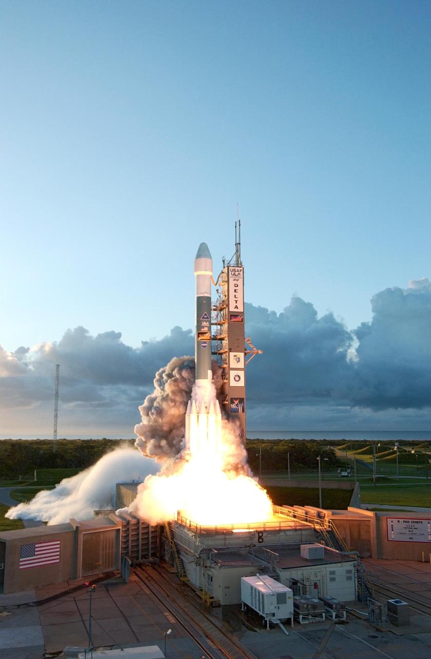 KENNEDY SPACE CENTER, FLA. -- Just Against a backdrop of clouds on the horizon, the Delta II rocket carrying NASA's Dawn spacecraft rises from the smoke and fire on the launch pad to begin its 1.7-billion-mile journey through the inner solar system to study a pair of asteroids. Liftoff was at 7:34 a.m. EDT from Pad 17-B at Cape Canaveral Air Force Station. Dawn is the ninth mission in NASA's Discovery Program. The spacecraft will be the first to orbit two planetary bodies, asteroid Vesta and dwarf planet Ceres, during a single mission. Vesta and Ceres lie in the asteroid belt between Mars and Jupiter. It is also NASA's first purely scientific mission powered by three solar electric ion propulsion engines. Photo credit: NASA/Tony Gray & Robert Murray