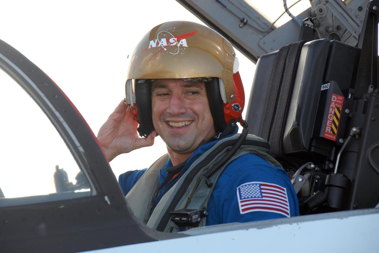 KENNEDY SPACE CENTER, FLA. -- The crew members of mission STS-120 arrive at NASA's Kennedy Space Center Shuttle Landing Facility aboard T-38 jet aircraft to take part in terminal countdown demonstration test activities. Pilot George Zamka, who will be making his first shuttle flight, prepares to exit the plane. The terminal countdown demonstration test provides astronauts and ground crews an opportunity to participate in various simulated countdown activities, including equipment familiarization and emergency training. The STS-120 mission will deliver the U.S. Node 2 module, named Harmony, aboard space shuttle Discovery to the International Space Station. Launch of Discovery on mission STS-120 is targeted for Oct. 23 at 11:38 a.m. EDT on a 14-day mission to the International Space Station. Photo credit: NASA/Kim Shiflett