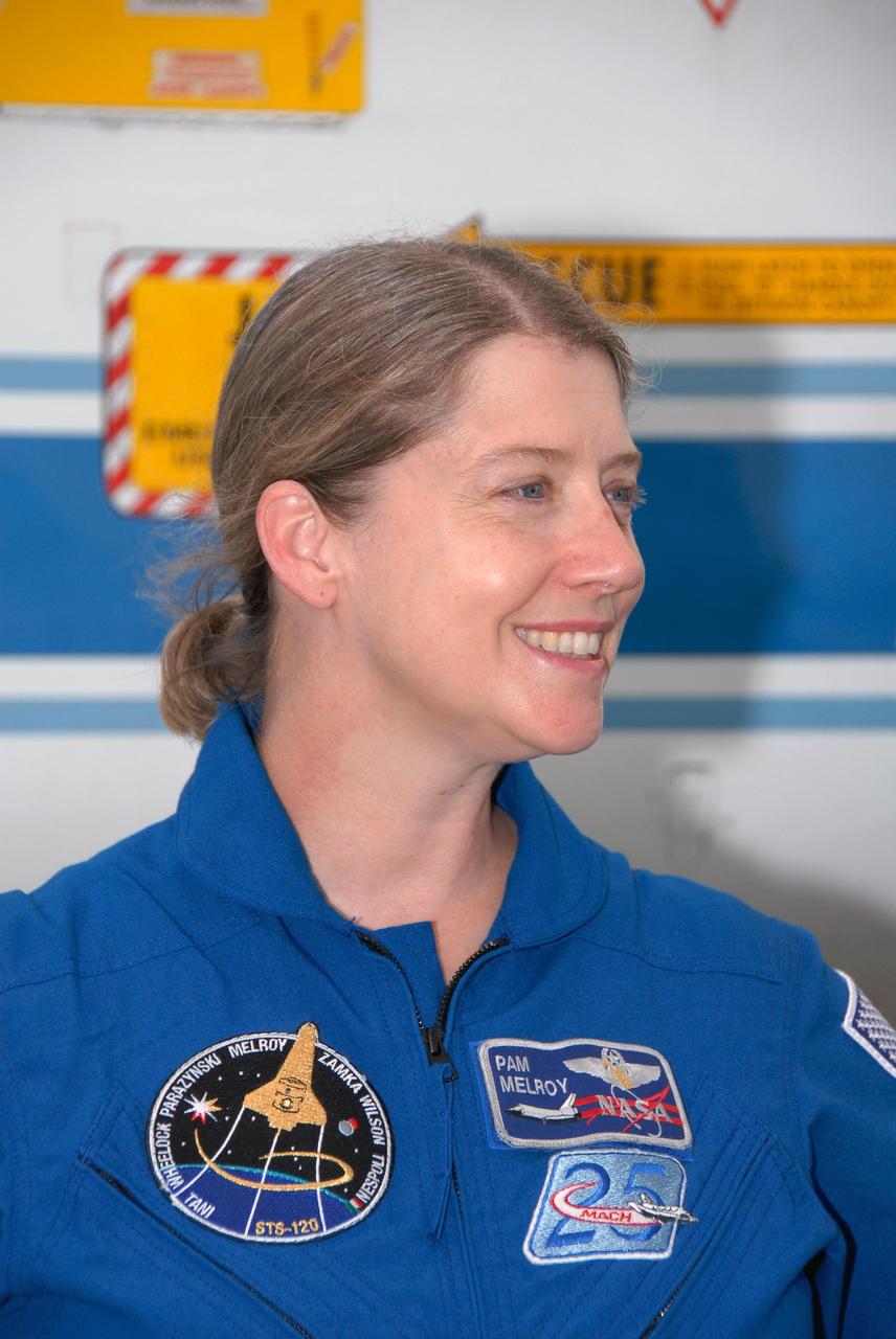 KENNEDY SPACE CENTER, FLA. -- The crew members of mission STS-120 arrive at NASA's Kennedy Space Center Shuttle Landing Facility aboard T-38 jet aircraft to take part in terminal countdown demonstration test activities. Commander Pam Melroy, seen here, will be making her third shuttle flight. She is the second woman to command a shuttle mission. The terminal countdown demonstration test provides astronauts and ground crews an opportunity to participate in various simulated countdown activities, including equipment familiarization and emergency training. The STS-120 mission will deliver the U.S. Node 2 module, named Harmony, aboard space shuttle Discovery to the International Space Station. Launch of Discovery on mission STS-120 is targeted for Oct. 23 at 11:38 a.m. EDT on a 14-day mission to the International Space Station. Photo credit: NASA/Kim Shiflett