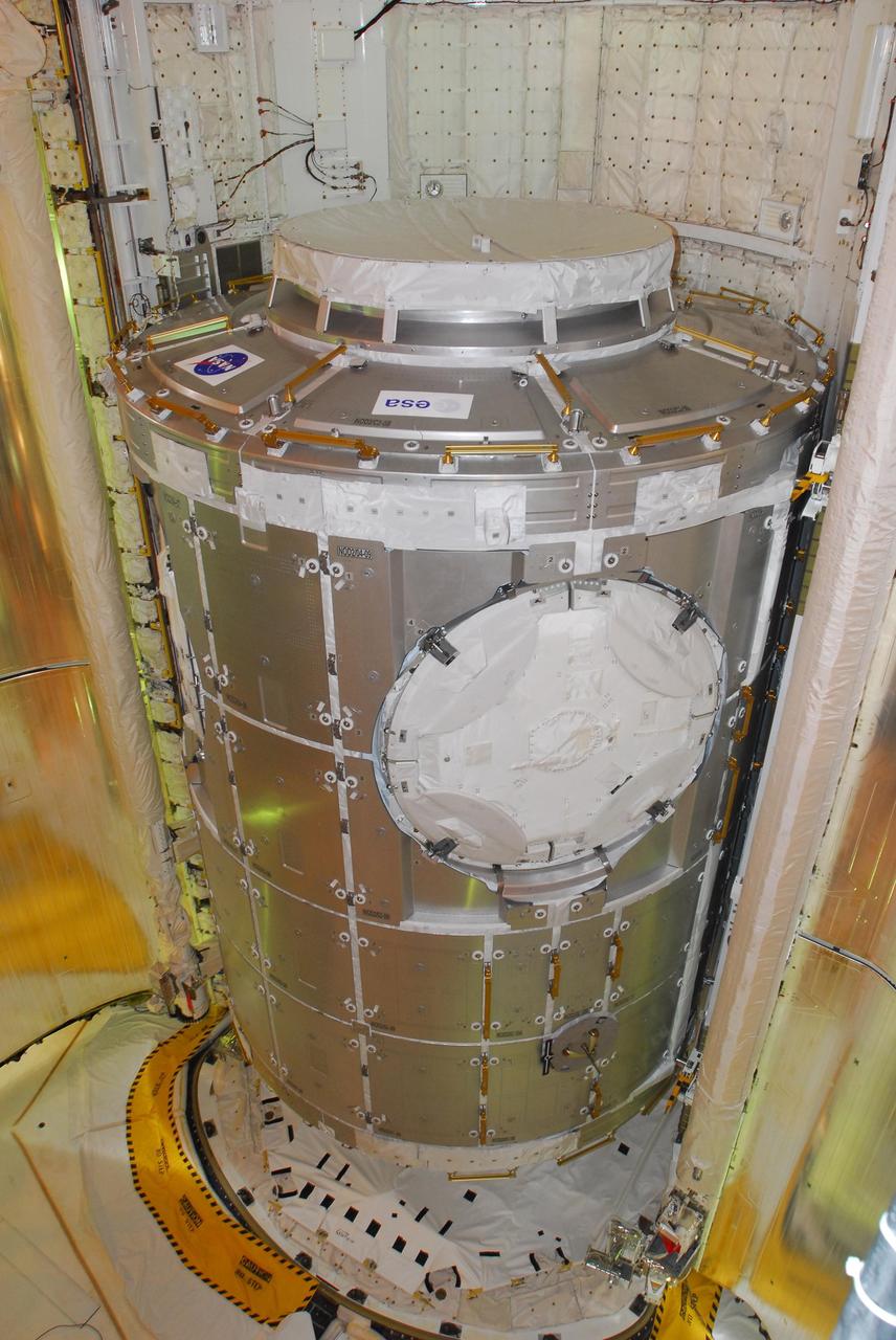 KENNEDY SPACE CENTER, FLA. -- From the payload changeout room on Launch Pad 39A, the payloads for mission STS-120 have been transferred into space shuttle Discovery's payload bay.  Seen here is the Italian-built U.S. Node 2 module, named Harmony.   Mission STS-120 will bring the Harmony module that will provide attachment points for European and Japanese laboratory modules to the International Space Station.  Launch of Discovery is targeted for Oct. 23.  Photo credit: NASA/George Shelton