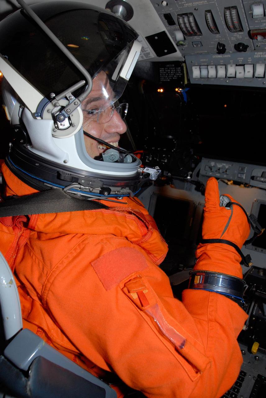 KENNEDY SPACE CENTER, FLA. --  Seated in the cockpit of the shuttle training aircraft, STS-120 Pilot George Zamka is eager to begin landing practice on NASA's Shuttle Landing Facility runway. A modified Grumman American Aviation-built Gulf Stream II jet, the STA simulates an orbiter's cockpit, motion and visual cues and handling qualities. In flight, the STA duplicates the orbiter's atmospheric descent trajectory from approximately 35,000 feet altitude to landing on a runway.  Melroy and other crew members are at Kennedy Space Center to take part in the terminal countdown demonstration test, which also includes a simulated launch countdown. Mission STS-120 is targeted for Oct. 23.  Photo credit: NASA/Kim Shiflett