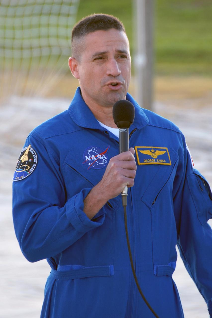 KENNEDY SPACE CENTER, FLA. --  STS-120 Pilot George Zamka responds to a question from the media during a press conference at the slidewire basket landing on Launch Pad 39A.  The crew is at NASA's Kennedy Space Center to take part in terminal countdown demonstration test activities that include emergency egress procedures and a simulated launch countdown.   Mission STS-120, which will carry the Italian-built U.S. Node 2 to the International Space Station, is targeted for launch on Oct. 23. Tani will remain aboard the station and return with the STS-122 crew, targeted to launch Dec. 6.  Photo credit: NASA/Kim Shiflett