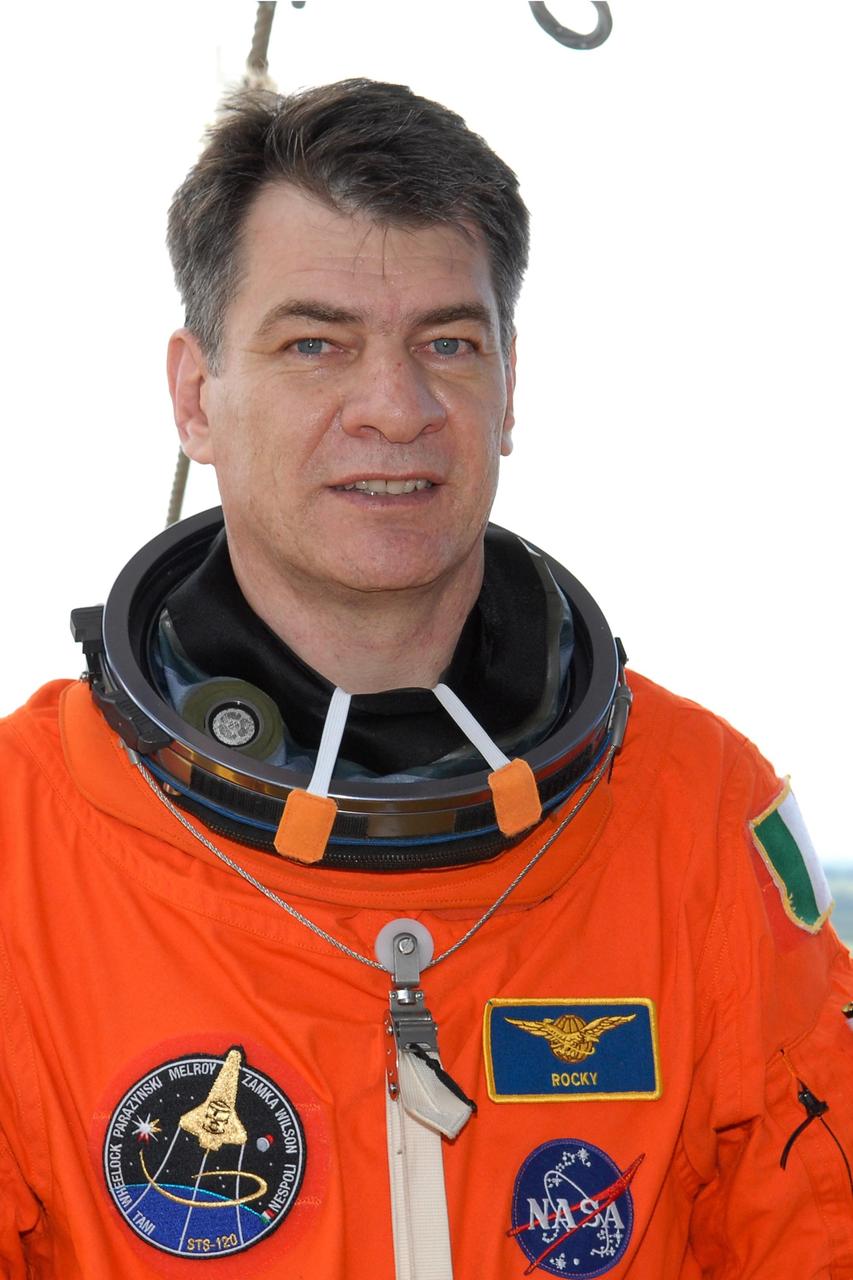 KENNEDY SPACE CENTER, FLA. -- STS-120 Mission Specialist Paolo Nespoli relaxes after practicing emergency egress, part of the prelaunch terminal countdown demonstration test, or TCDT.  His name patch reflects the nicknames the crew gave each other for the event.  The TCDT at NASA's Kennedy Space Center provides astronauts and ground crews an opportunity to participate in various launch preparation activities, including equipment familiarization and emergency training. The STS-120 mission will deliver the U.S. Node 2 module, named Harmony, aboard space shuttle Discovery to the International Space Station.  Discovery is targeted to launch on its 14-day mission at 11:38 a.m. EDT on Oct. 23. Photo credit: NASA/Kim Shiflett