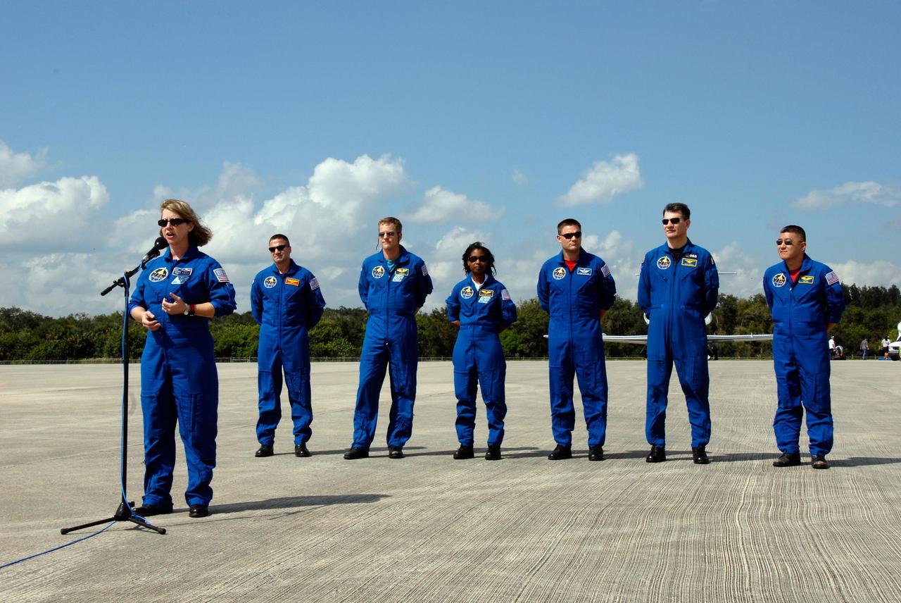 KENNEDY SPACE CENTER, FLA. -- At the Shuttle Landing Facility of NASA's Kennedy Space Center, STS-120 Commander Pamela Melroy addresses the spectators who welcomed the crew's arrival. Behind her are Pilot George Zamka and Mission Specialists Scott Parazynski, Stephanie Wilson, Doug Wheelock, Paolo Nespoli and Daniel Tani. Nespoli represents the European Space Agency. Tani will be remaining on the International Space Station to join the Expedition 16 crew after the mission is complete. The crew has returned to Kennedy to prepare for launch aboard space shuttle Discovery at 11:38 a.m. EDT on Oct. 23. The mission will be the 23rd shuttle flight to the International Space Station, delivering the Italian-built U.S. Node 2, called Harmony. The 14-day mission includes five spacewalks -- four by shuttle crew members and one by the station’s Expedition 16 crew -- to install Harmony and move the P6 solar arrays to their permanent position and deploy them. Discovery is expected to complete its mission and return home at 4:47 a.m. EST on Nov. 6. Photo credit: NASA/Kim Shiflett