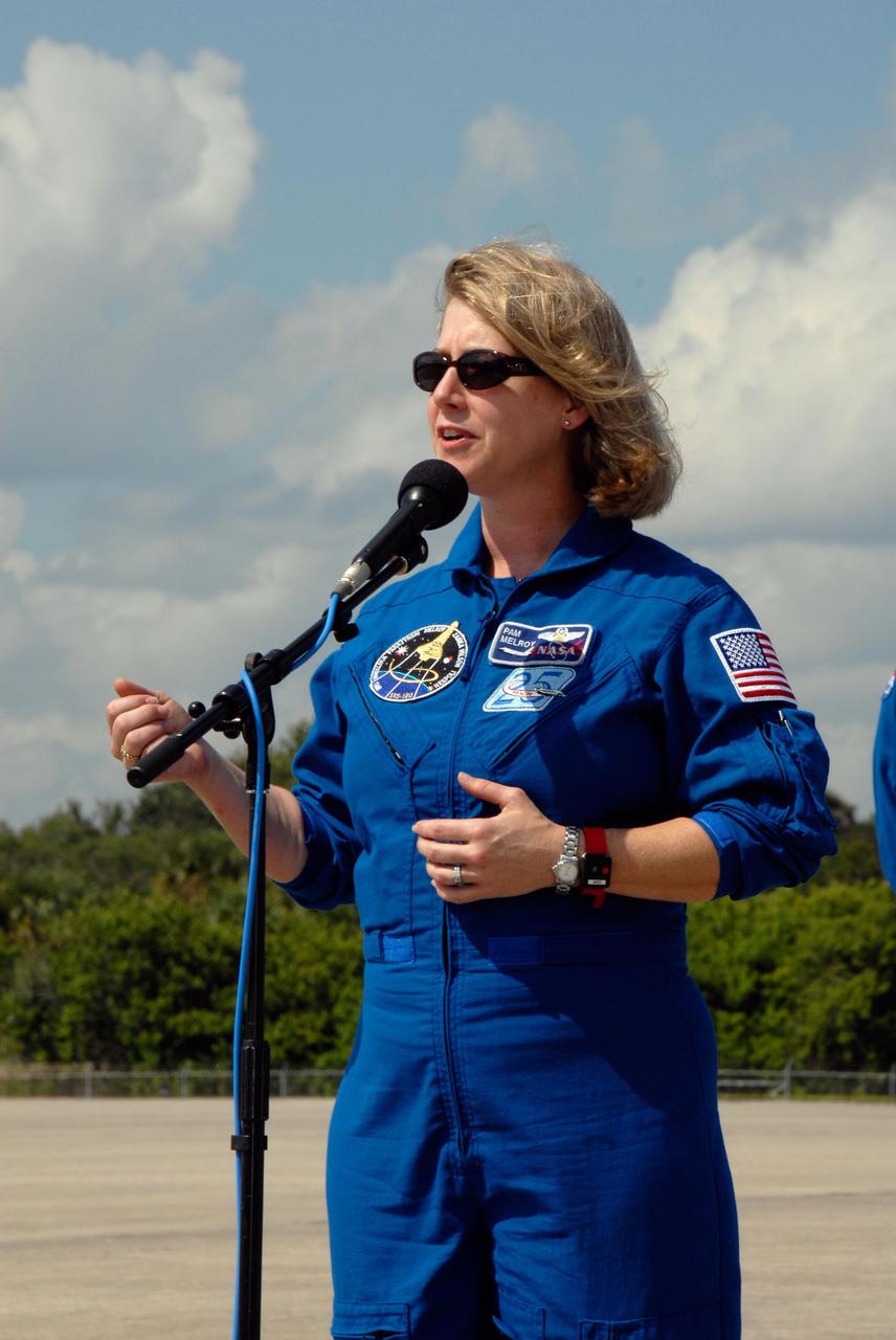 KENNEDY SPACE CENTER, FLA. --  At the Shuttle Landing Facility of NASA's Kennedy Space Center, STS-120 Commander Pamela Melroy addresses the spectators who welcomed the crew's arrival.  Melroy will be making her third shuttle flight, the second woman to command a shuttle mission.  The crew has returned to Kennedy to prepare for launch aboard space shuttle Discovery at 11:38 a.m. EDT on Oct. 23.  The mission will be the 23rd shuttle flight to the International Space Station, delivering the Italian-built U.S. Node 2, called Harmony.  The 14-day mission includes five spacewalks -- four by shuttle crew members and one by the station’s Expedition 16 crew -- to install Harmony and move the P6 solar arrays to their permanent position and deploy them.  Discovery is expected to complete its mission and return home at 4:47 a.m. EST on Nov. 6.   Photo credit: NASA/Kim Shiflett