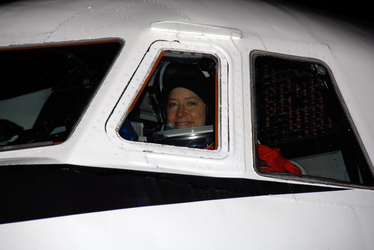 KENNEDY SPACE CENTER, FLA. -- A glimpse of STS-120 Commander Pam Melroy is caught in the cockpit of a Shuttle Training Aircraft, or STA, at NASA Kennedy Space Center's Shuttle Landing Facility.  She and STS-120 Pilot George Zamka are training for their upcoming space shuttle mission by practicing landings in STAs. Melroy is the second woman to command a shuttle mission. Also assigned to STS-120 are Mission Specialists Scott Parazynski, Stephanie Wilson, Doug Wheelock, Paolo Nespoli and Daniel Tani. Nespoli represents the European Space Agency. Tani will remain on the International Space Station as an Expedition 16 flight engineer after the STS-120 mission is complete. The mission will be the 23rd shuttle flight to the International Space Station, delivering the Italian-built U.S. Node 2, called Harmony. The crew arrived at Kennedy on Oct. 19 to prepare for launch aboard space shuttle Discovery at 11:38 a.m. EDT Oct. 23. The 14-day mission includes five spacewalks -- four by shuttle crew members and one by the station's Expedition 16 crew -- to install Harmony and move the P6 solar arrays to their permanent position and deploy them. Discovery is scheduled to complete its mission and return home on Nov. 6.  Photo credit: NASA/Kim Shiflett
