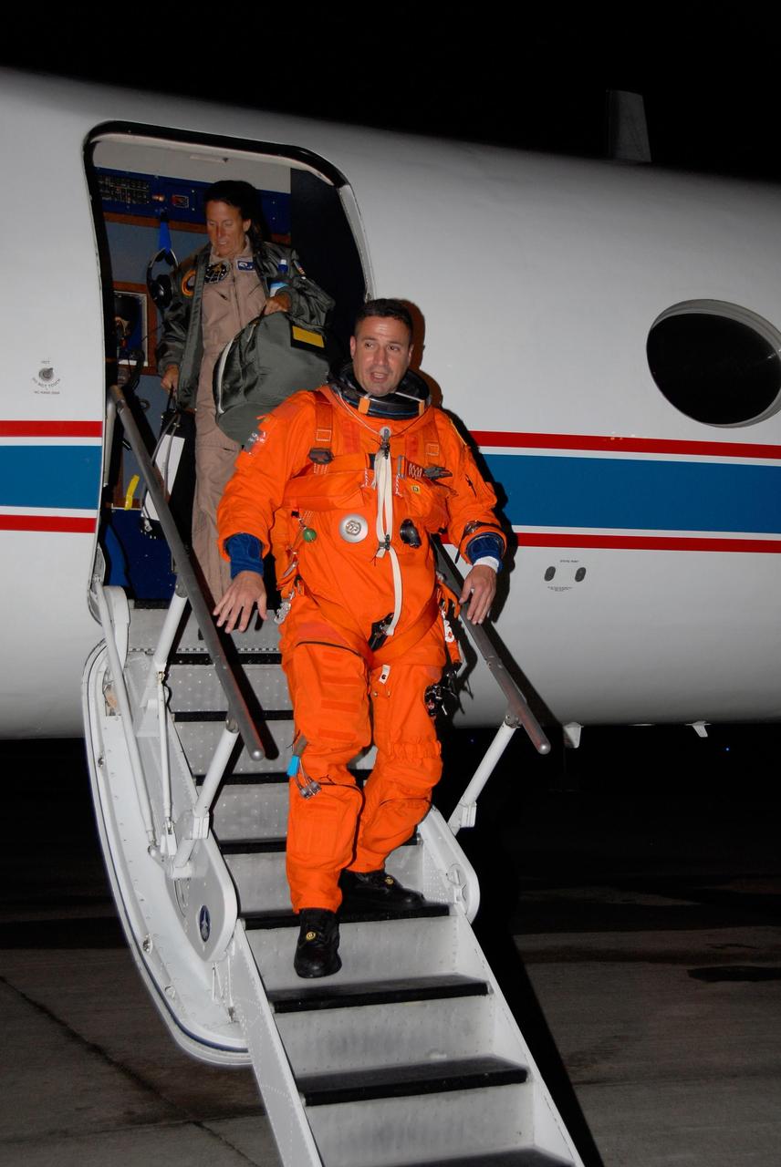 KENNEDY SPACE CENTER, FLA. -- STS-120 Pilot George Zamka disembarks from a Shuttle Training Aircraft, or STA, at NASA Kennedy Space Center's Shuttle Landing Facility.  He and STS-120 Commander Pam Melroy were training for their upcoming space shuttle mission by practicing landings in STAs.  Melroy is the second woman to command a shuttle mission. Also assigned to STS-120 are Mission Specialists Scott Parazynski, Stephanie Wilson, Doug Wheelock, Paolo Nespoli and Daniel Tani. Nespoli represents the European Space Agency. Tani will remain on the International Space Station as an Expedition 16 flight engineer after the STS-120 mission is complete. The mission will be the 23rd shuttle flight to the International Space Station, delivering the Italian-built U.S. Node 2, called Harmony. The crew arrived at Kennedy on Oct. 19 to prepare for launch aboard space shuttle Discovery at 11:38 a.m. EDT Oct. 23. The 14-day mission includes five spacewalks -- four by shuttle crew members and one by the station's Expedition 16 crew -- to install Harmony and move the P6 solar arrays to their permanent position and deploy them. Discovery is scheduled to complete its mission and return home on Nov. 6.  Photo credit: NASA/Kim Shiflett
