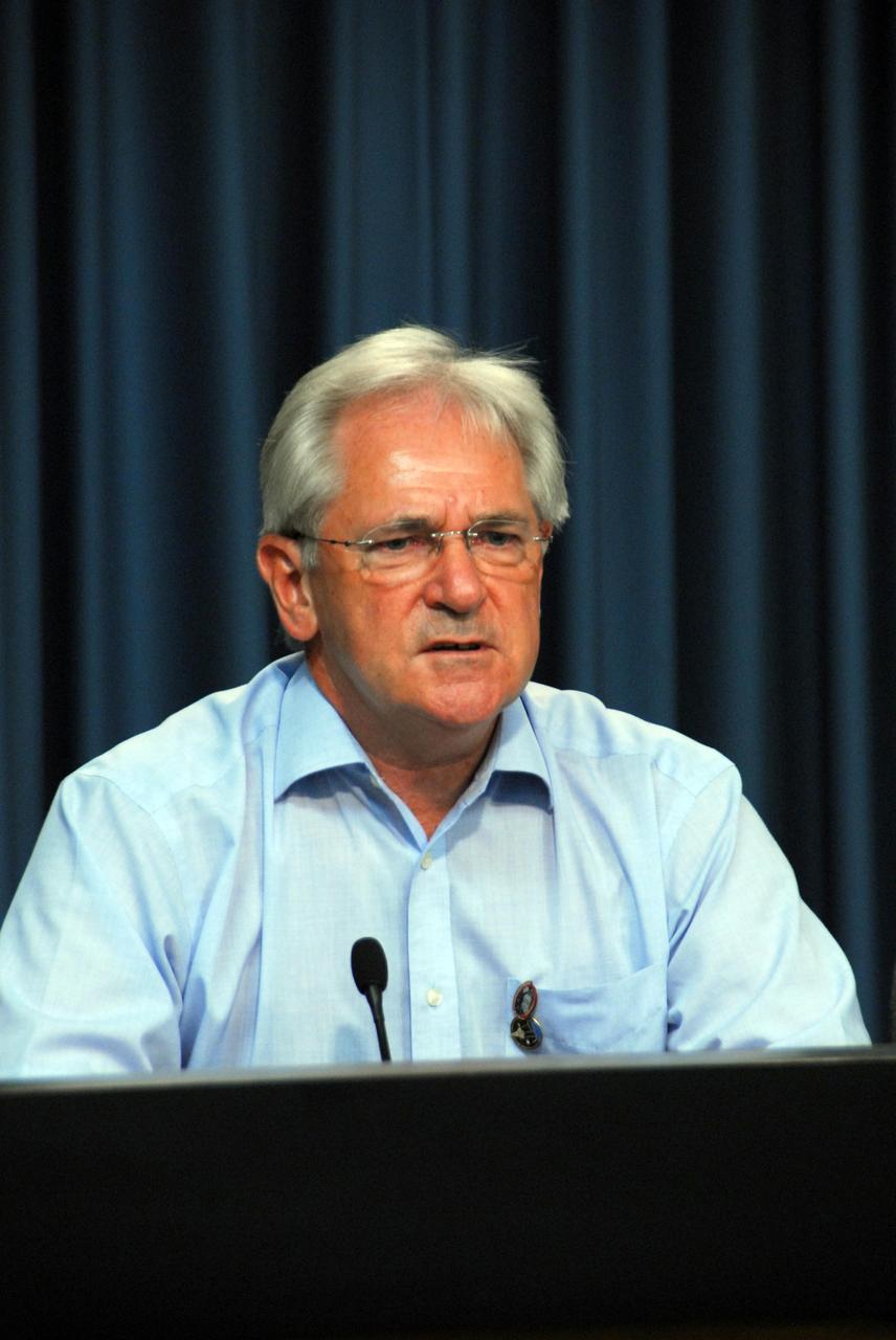 KENNEDY SPACE CENTER, FLA. -- Alan Thirkettle, the International Space Station Program Manager for ESA, the European Space Agency, answers questions from the media during a news briefing on the launch readiness of space shuttle mission STS-120.  The STS-120 mission will be the 23rd shuttle flight to the International Space Station, delivering the Italian-built U.S. Node 2, called Harmony. The seven-member crew includes ESA astronaut Paolo Nespoli from Italy. The 14-day mission includes five spacewalks -- four by shuttle crew members and one by the station's Expedition 16 crew -- to install Harmony and move the P6 solar arrays to their permanent position and deploy them. Launch aboard space shuttle Discovery is planned for 11:38 a.m. EDT Oct. 23, and Discovery is scheduled to complete its mission and return home on Nov. 6.  Photo credit: NASA/George Shelton